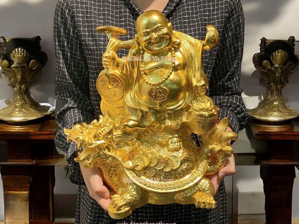 TƯỢNG PHẬT DI LẶC CƯỠI LONG QUY GÁNH TIỀN DÁT VÀNG 24K CAO 36CM NẶNG 7KG