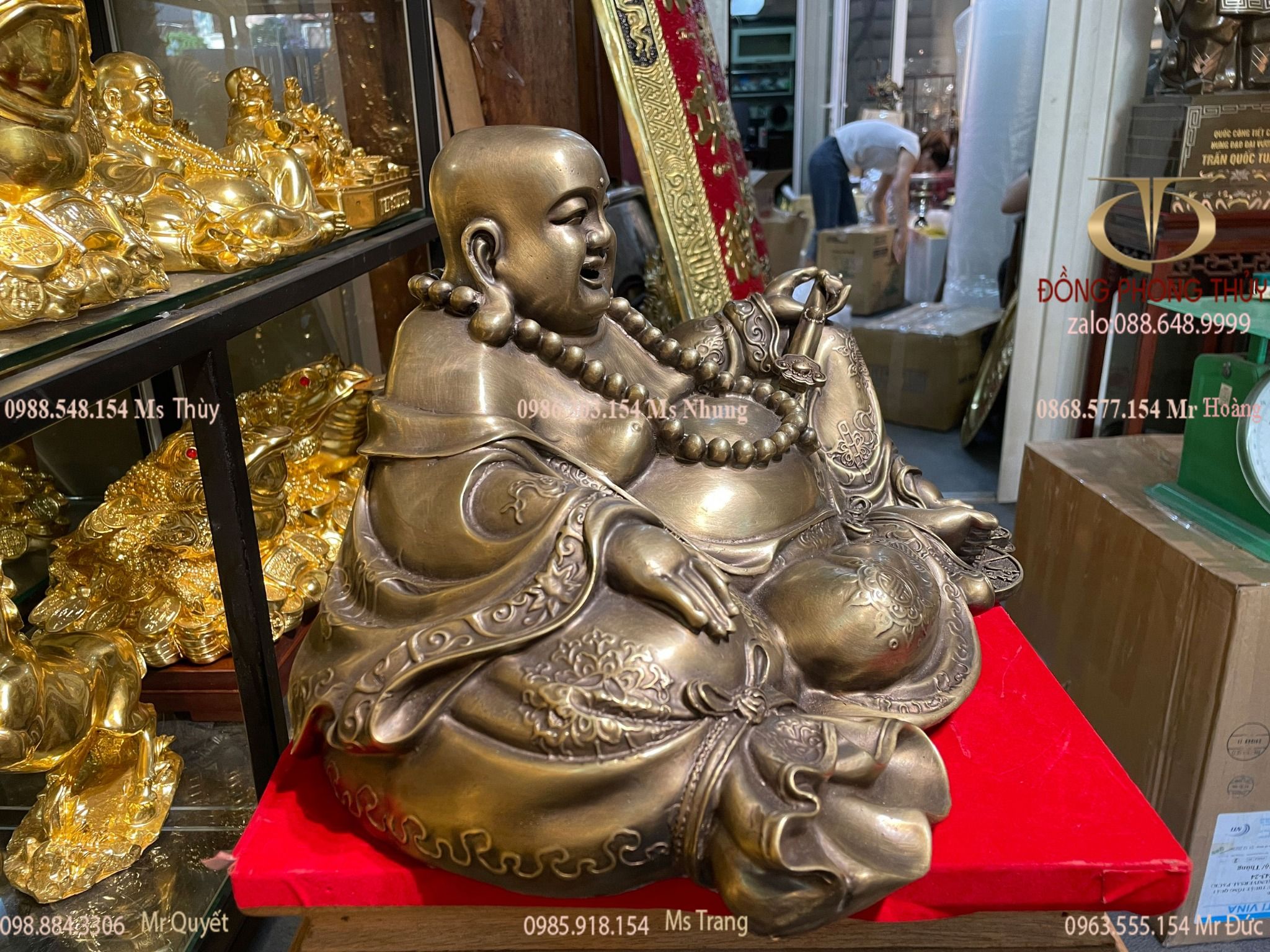 Tượng di lặc bằng đồng dựa bị