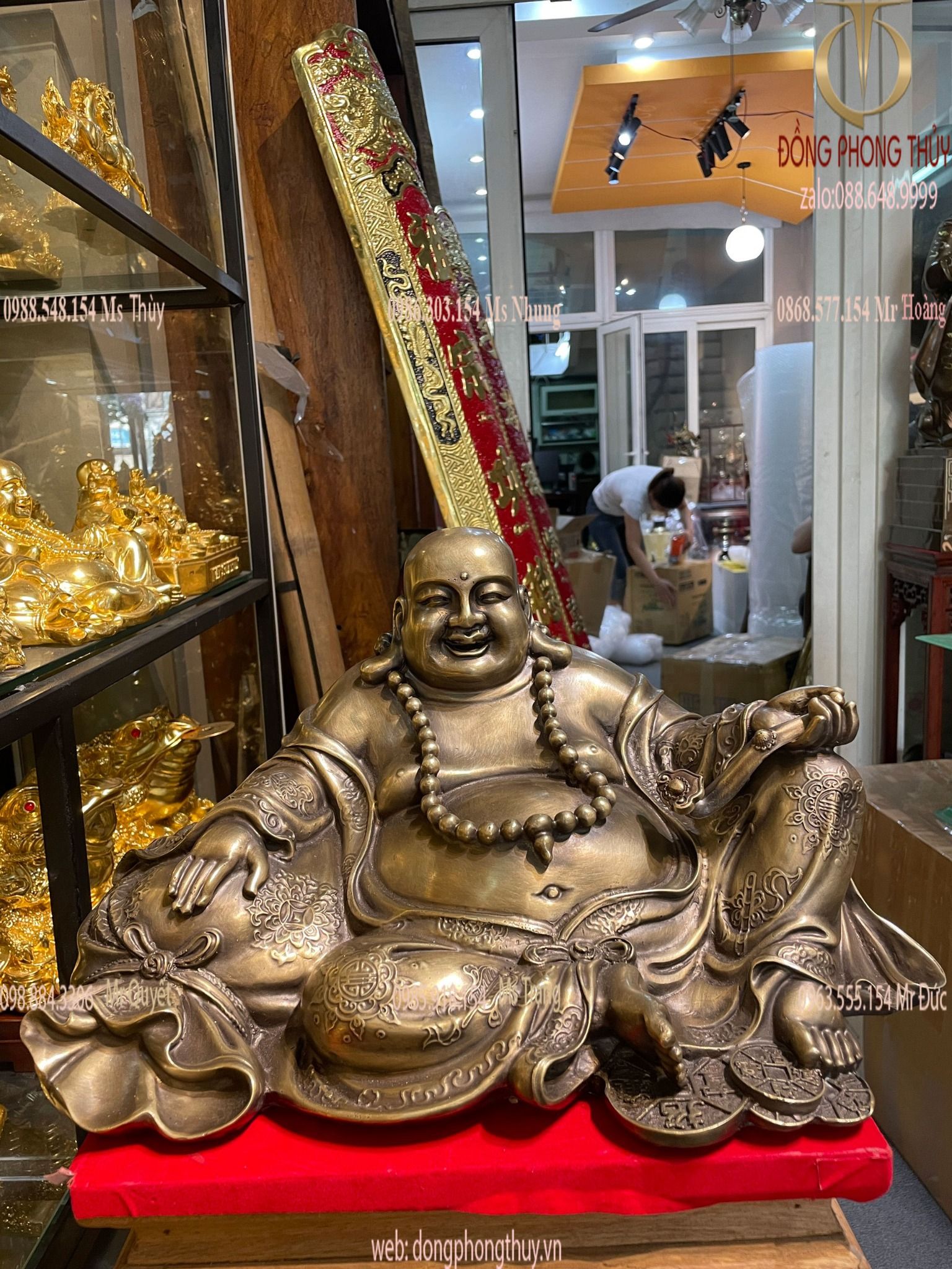 Tượng di lặc bằng đồng dựa bị