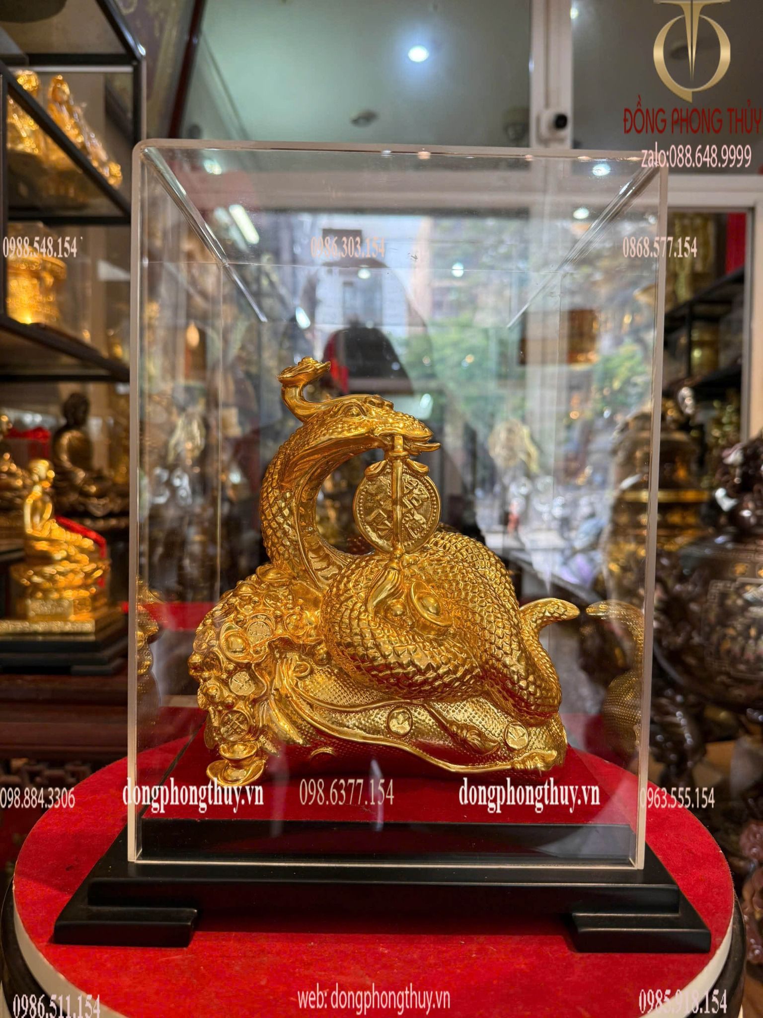 Tượng rắn cưỡi bao tiền dát vàng 24k