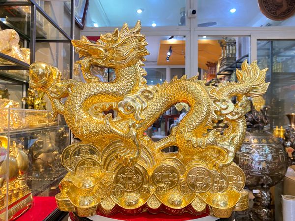 Tượng rồng mạ vàng 24k cưỡi tiền