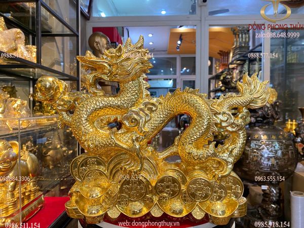 Tượng rồng mạ vàng 24k cưỡi tiền