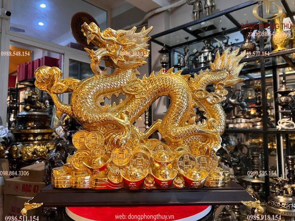 Tượng rồng đế tiền dát vàng 24k