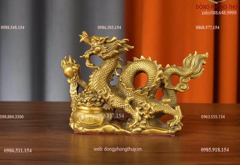 Tượng rồng đế tiền hũ vàng