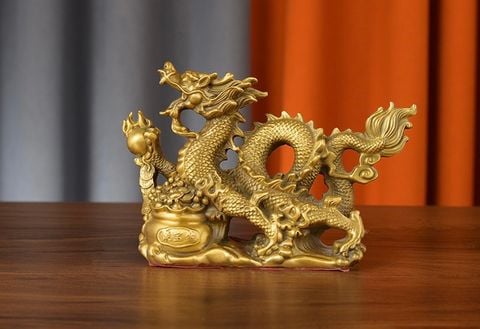 Tượng rồng đế tiền hũ vàng