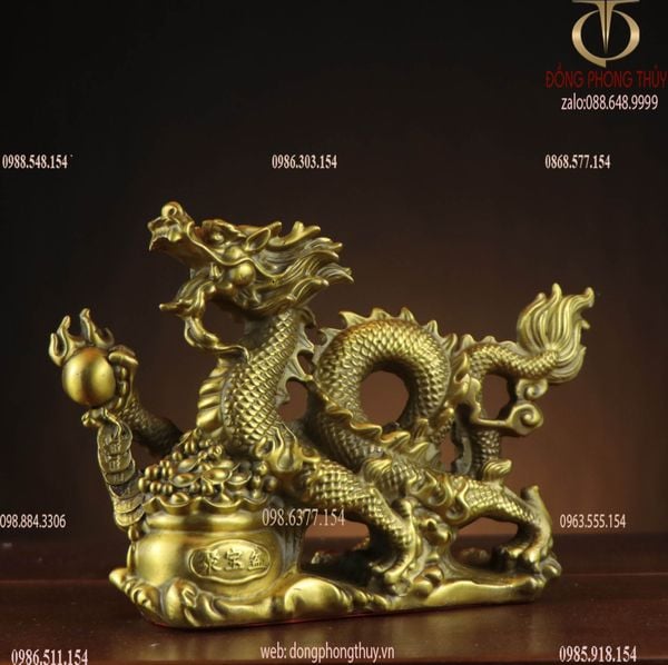 Tượng rồng đế tiền hũ vàng