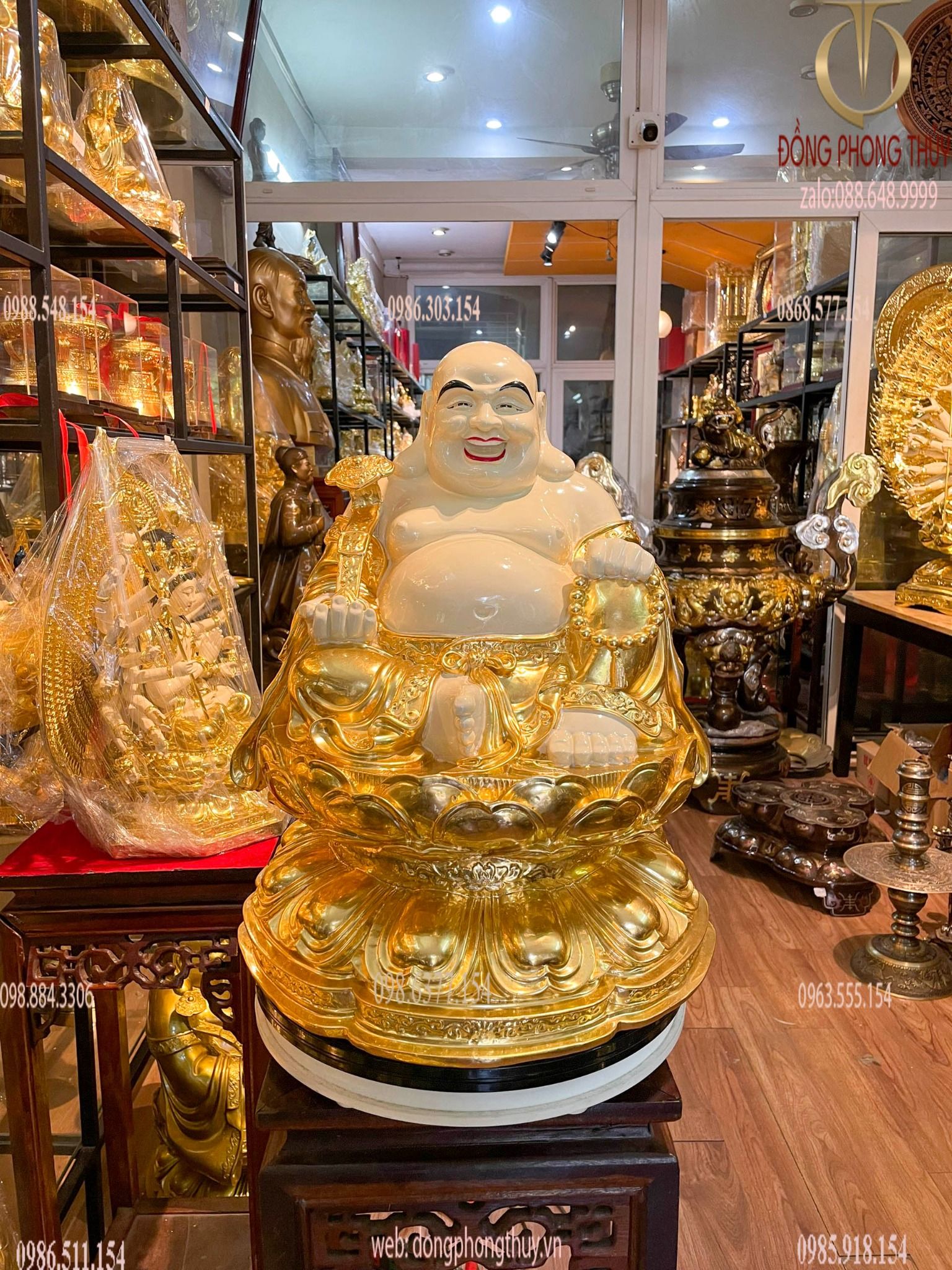 Tượng Di Lặc tọa đài sen dát vàng vẽ màu cao 50cm