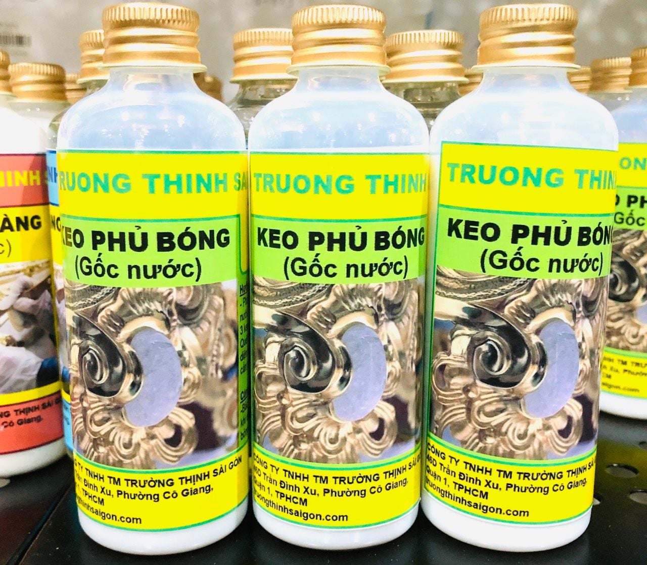 Keo phủ bóng dát vàng gốc nước