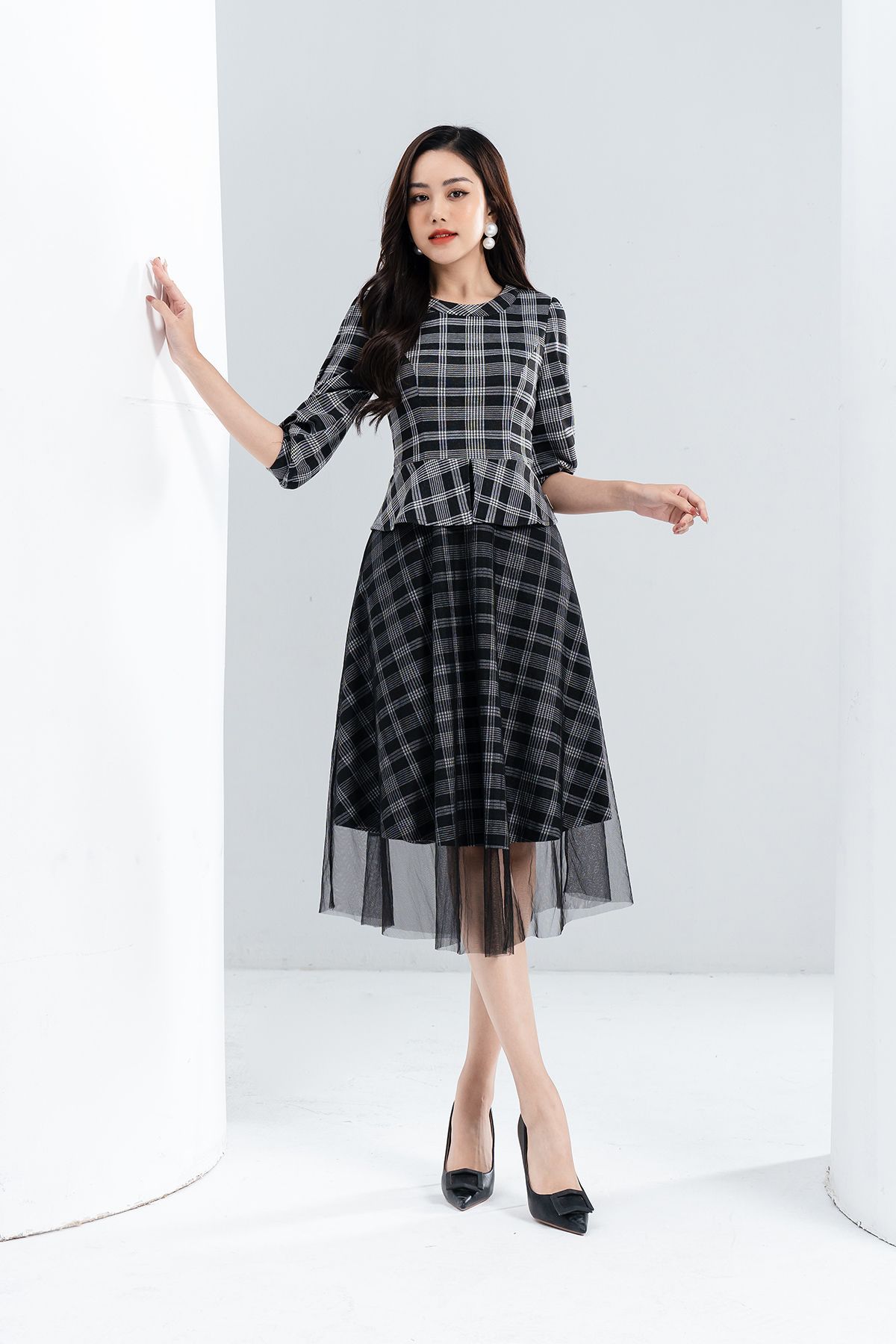 Đầm kẻ peplum - L63L22T042