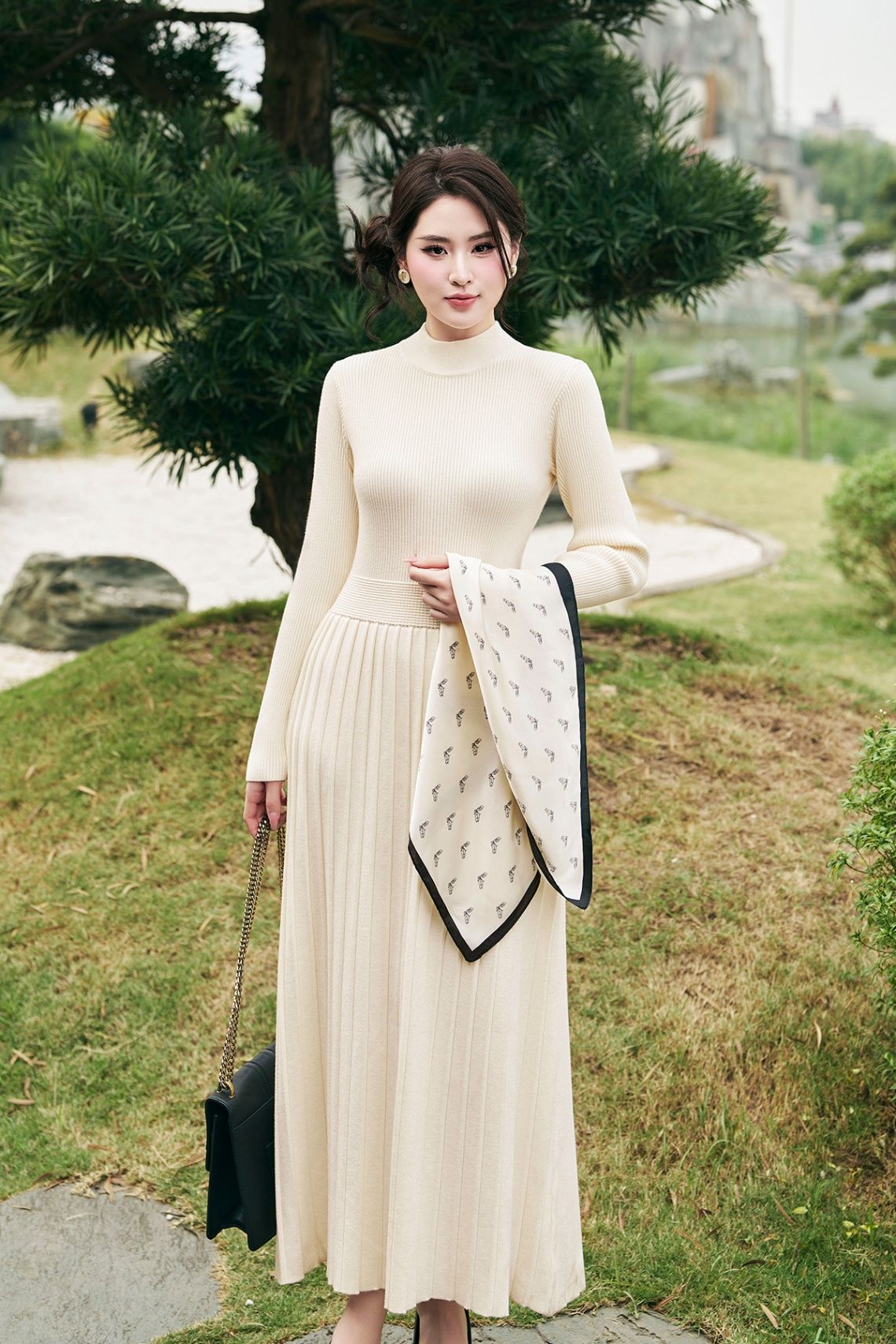 Đầm len tăm dài tay tùng dập ly - L63L24T006