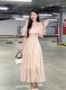 Đầm maxi nhún tầng trễ vai - N63M24H016