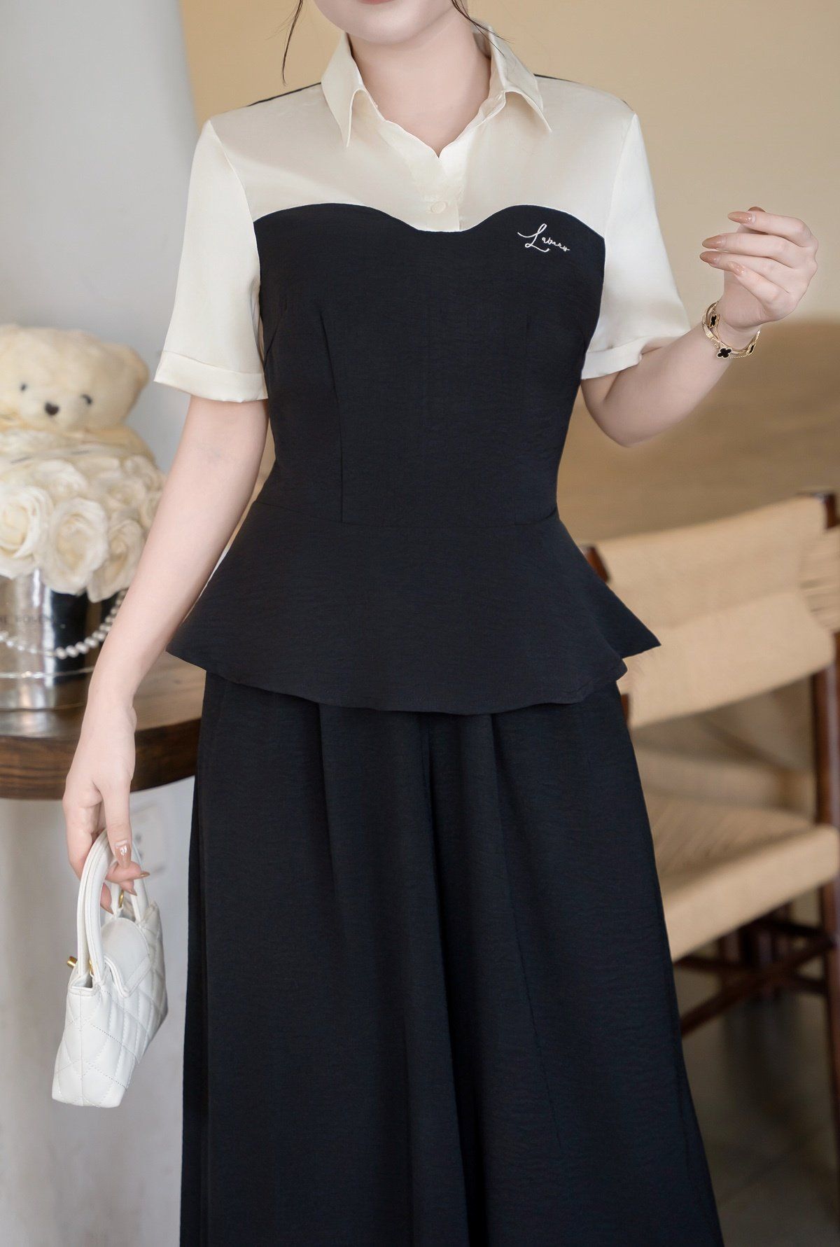 Áo peplum phối cầu ngực - O61B25Q003