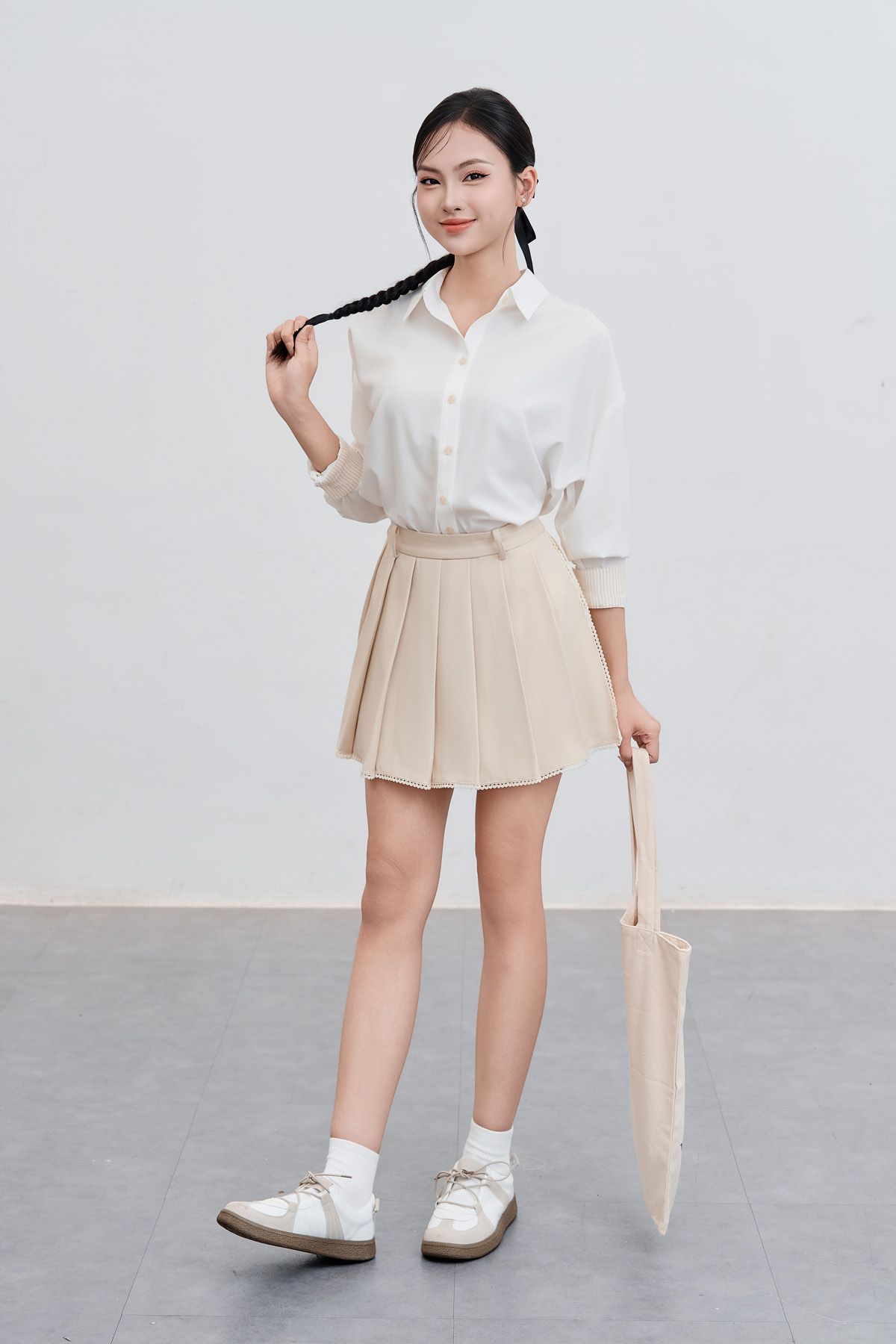 Quần short giả váy kẹp ren  - V64S25H001