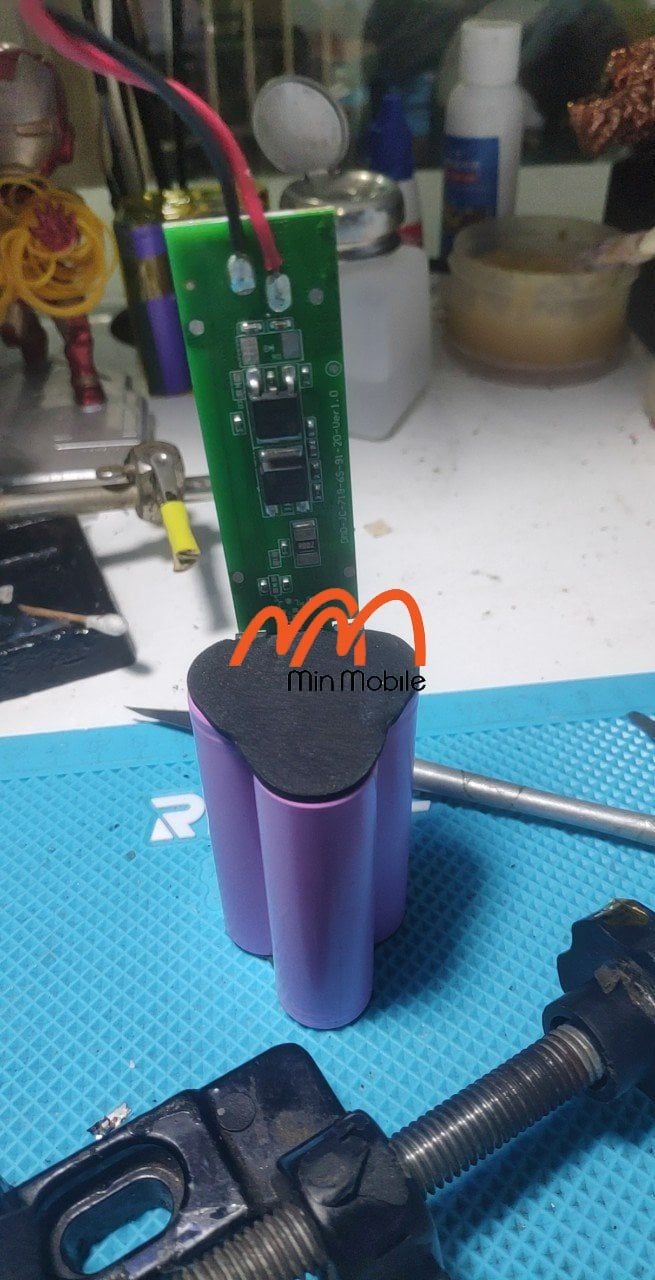 Thay Pin Súng Massage Cầm Tay Booster - E