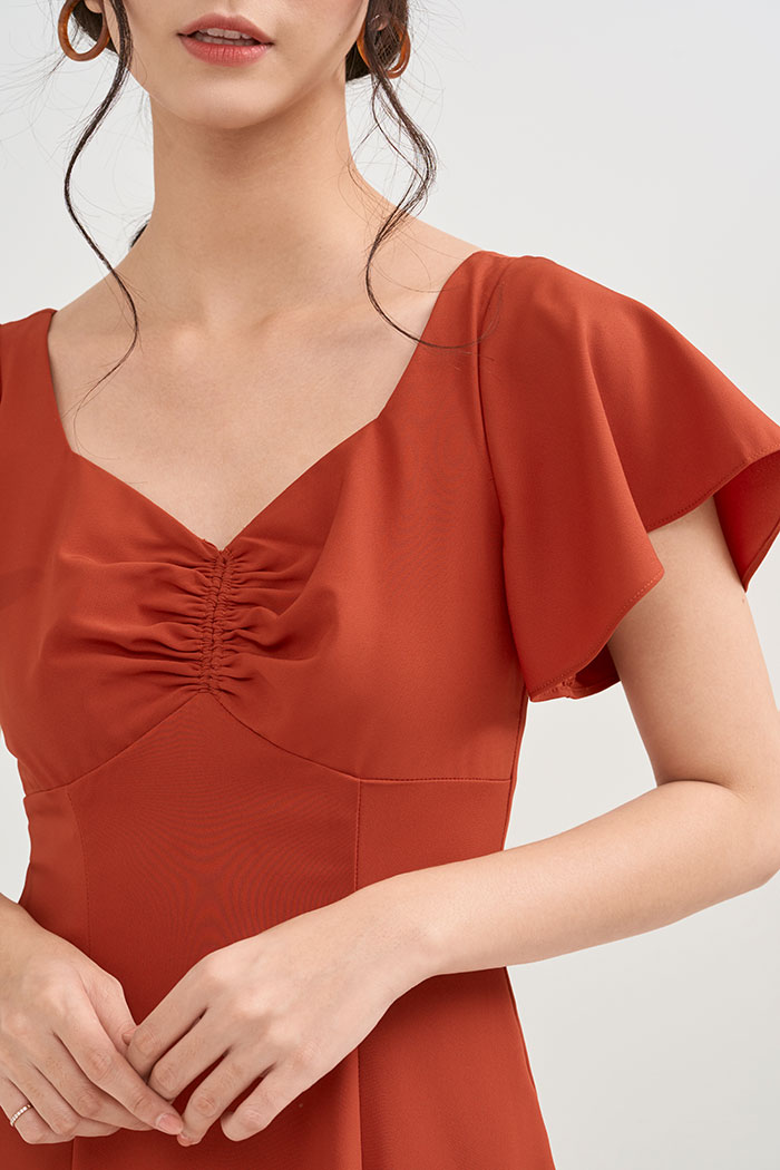 Đầm rút nhún ngực tay con rã cúp