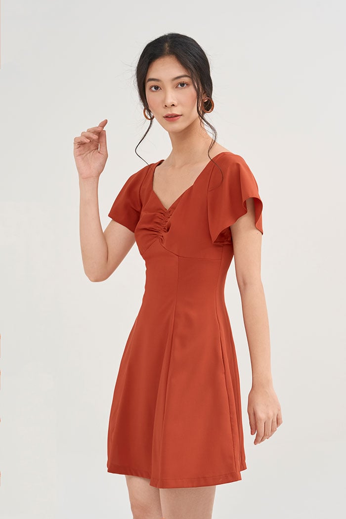 Đầm rút nhún ngực tay con rã cúp