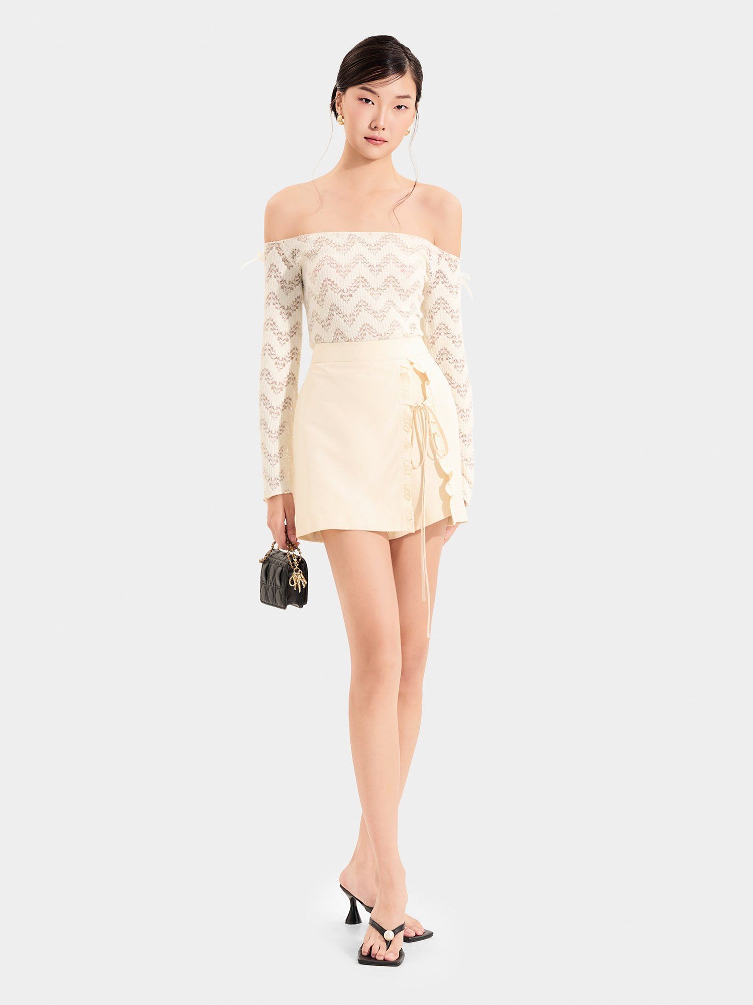  Váy skort xẻ trước phối bèo thắt nơ 