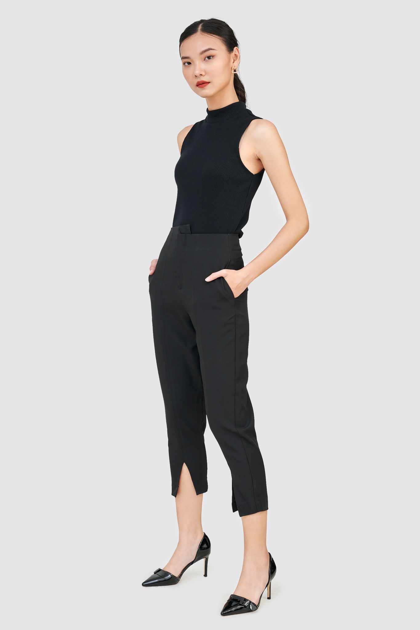 Áo knit sát nách cổ cao