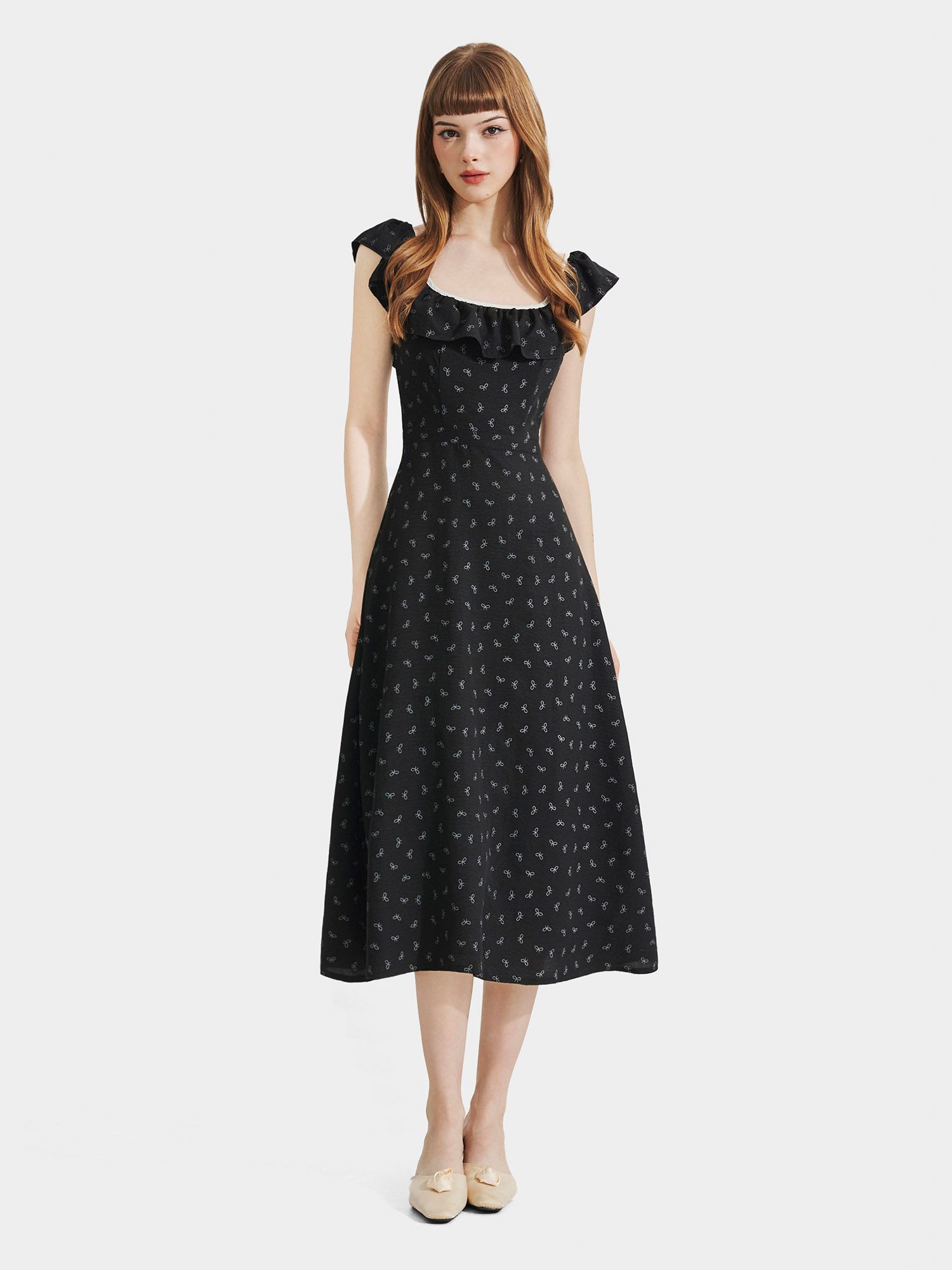  Đầm midi họa tiết nơ sát nách cổ phối bèo 