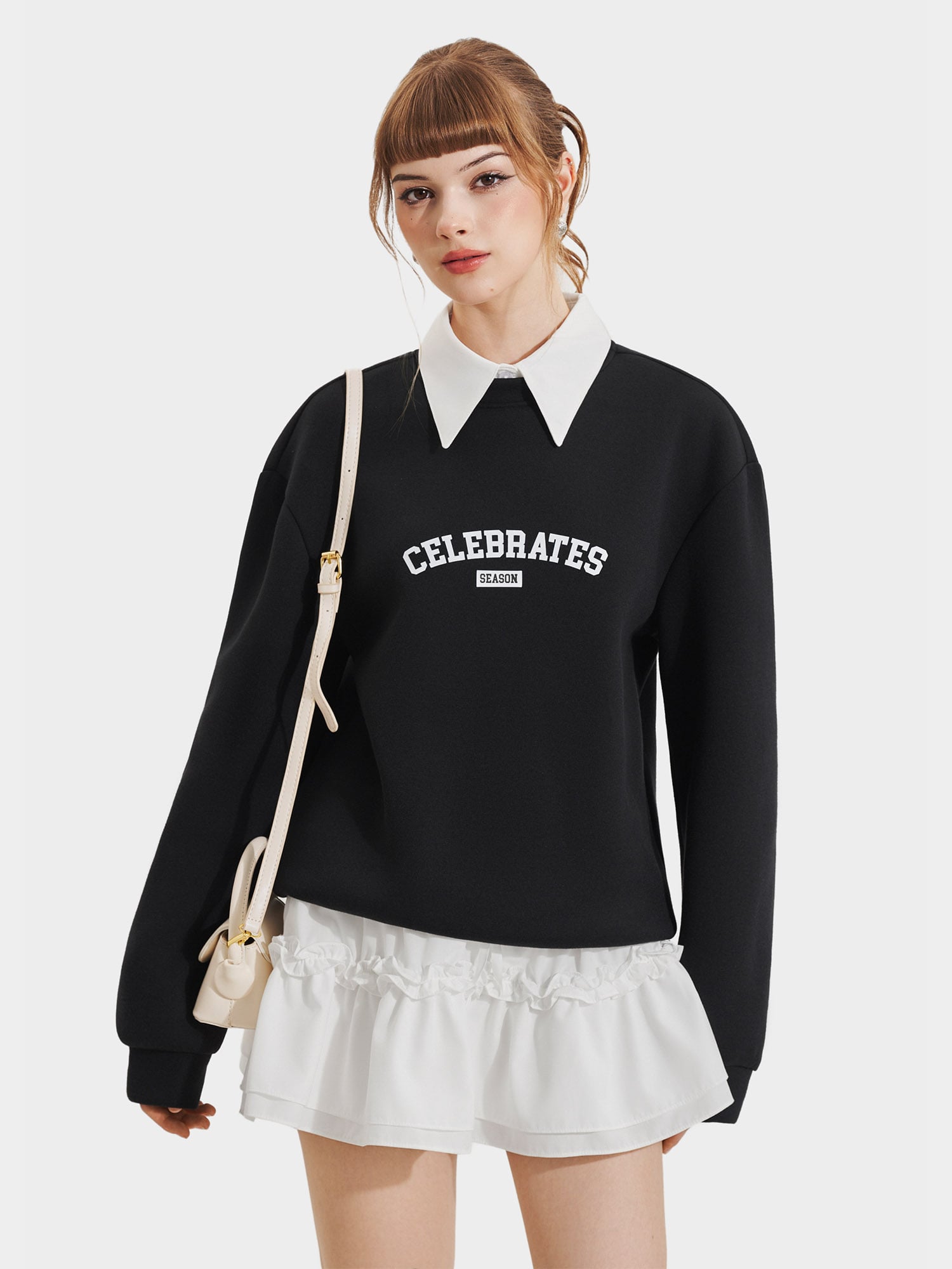 Áo sweater phối cổ sơ mi in chữ
