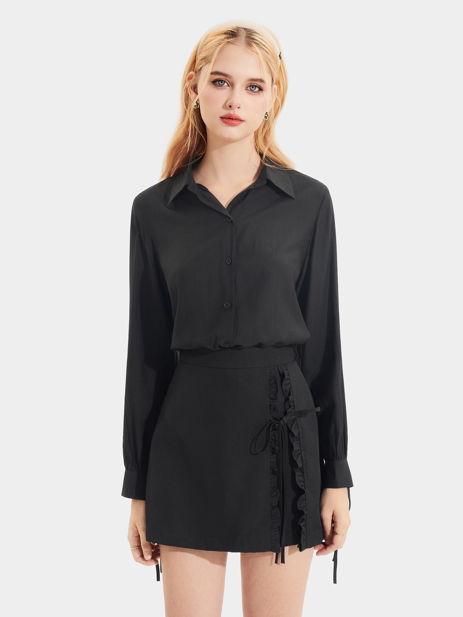 Váy skort xẻ trước phối bèo thắt nơ