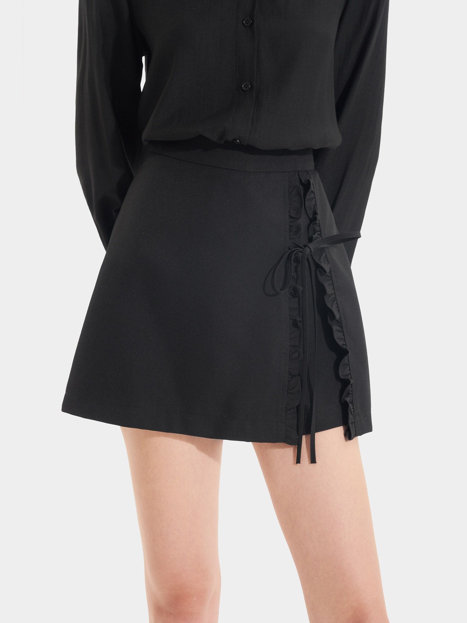  Váy skort xẻ trước phối bèo thắt nơ 
