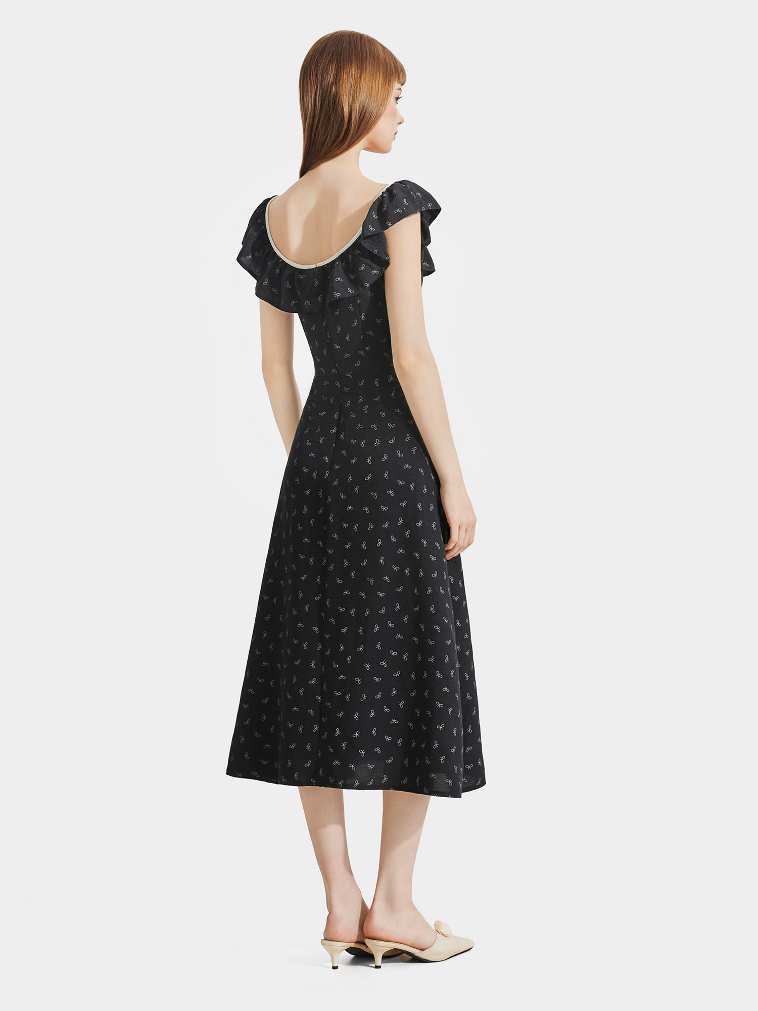 Đầm midi họa tiết nơ sát nách cổ phối bèo