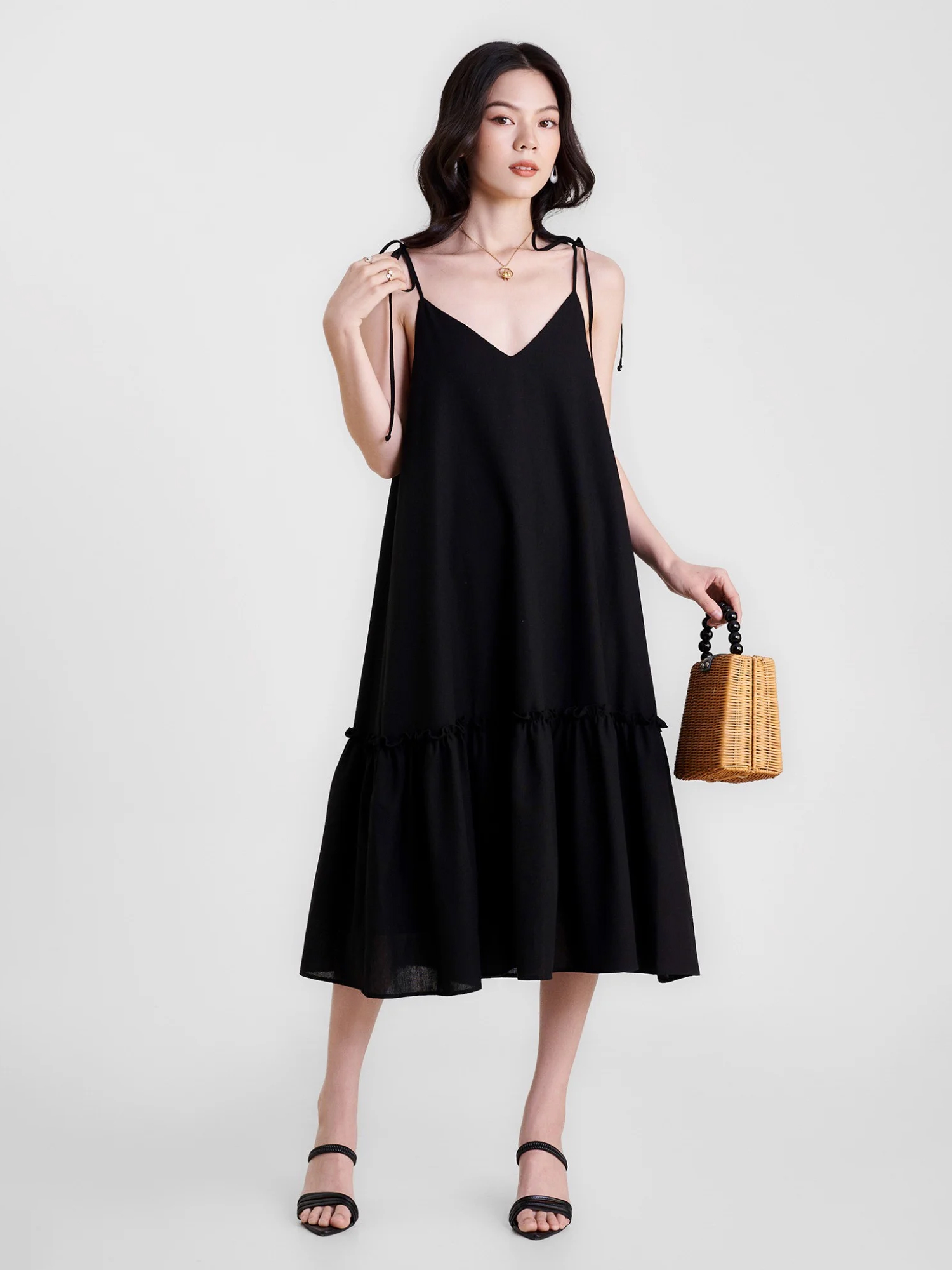 Đầm linen midi 2 dây xẻ V