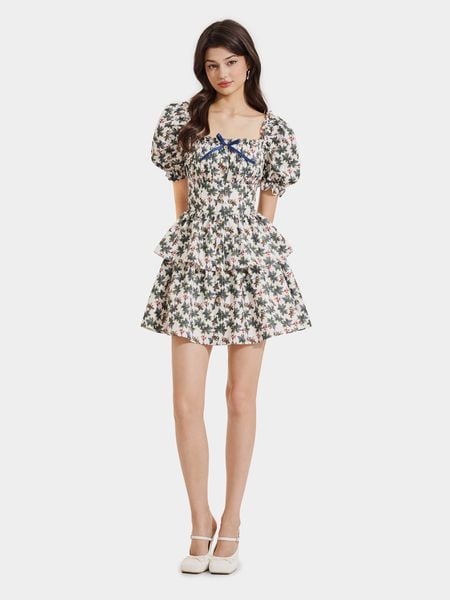  Đầm mini in họa tiết tay phồng nhún thun đính nơ ngực 