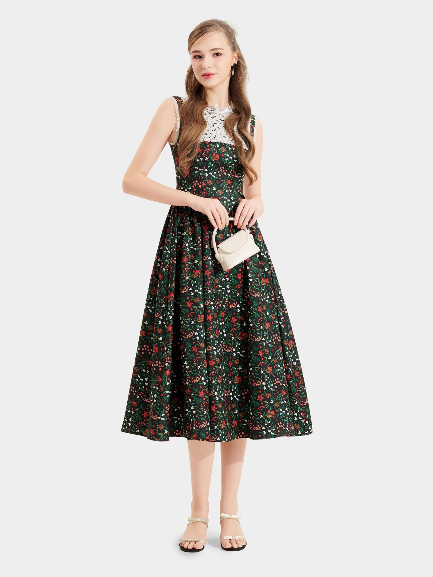  Đầm midi hoa sát nách cổ tròn đắp ren đính nơ ngực 