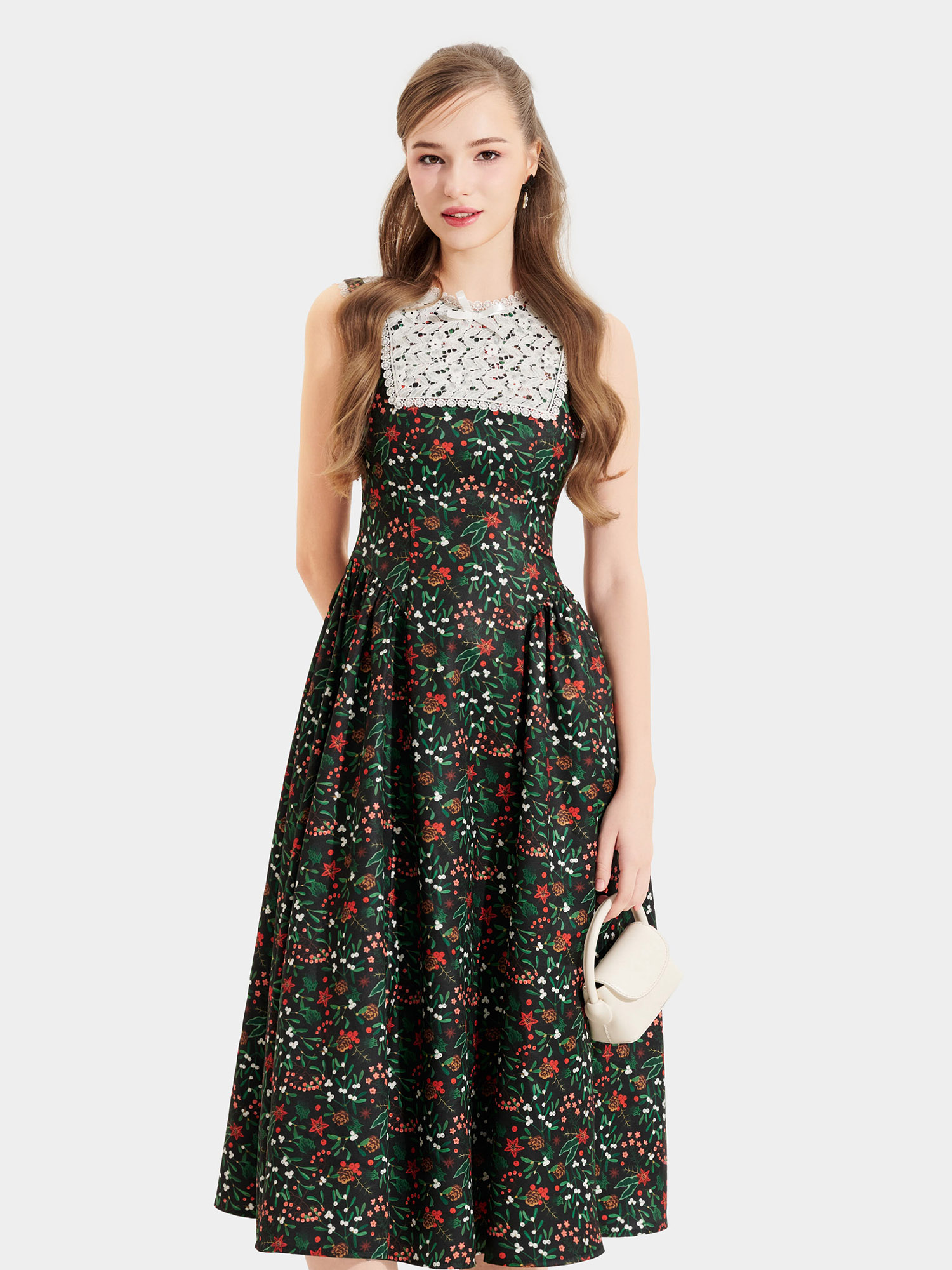 Đầm midi hoa sát nách cổ tròn đắp ren đính nơ ngực