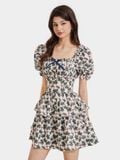  Đầm mini in họa tiết tay phồng nhún thun đính nơ ngực 