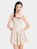  Đầm mini in hoa nhún ngực tùng xòe phối ren đính nơ ngực 
