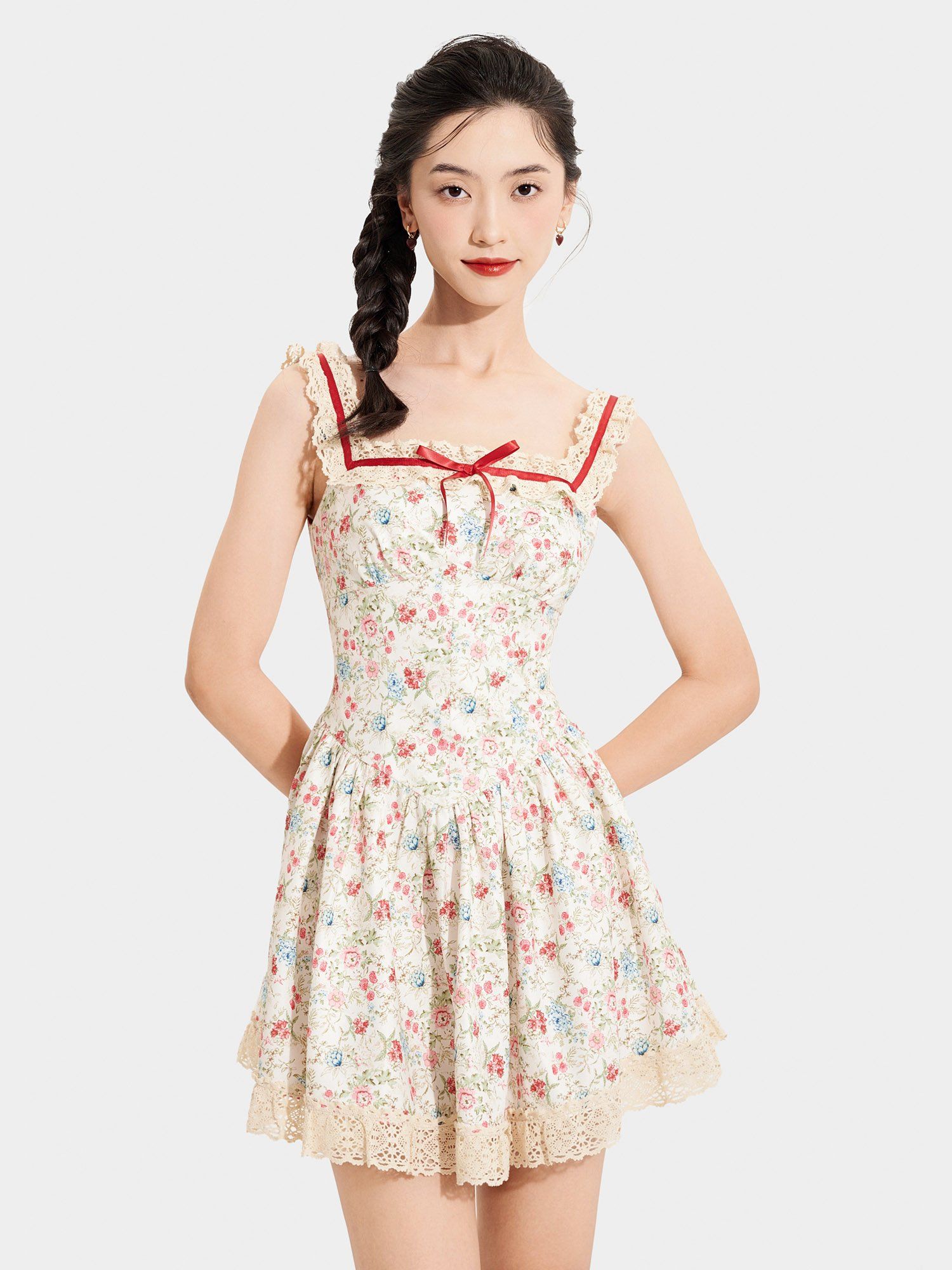  Đầm mini in hoa nhún ngực tùng xòe phối ren đính nơ ngực 