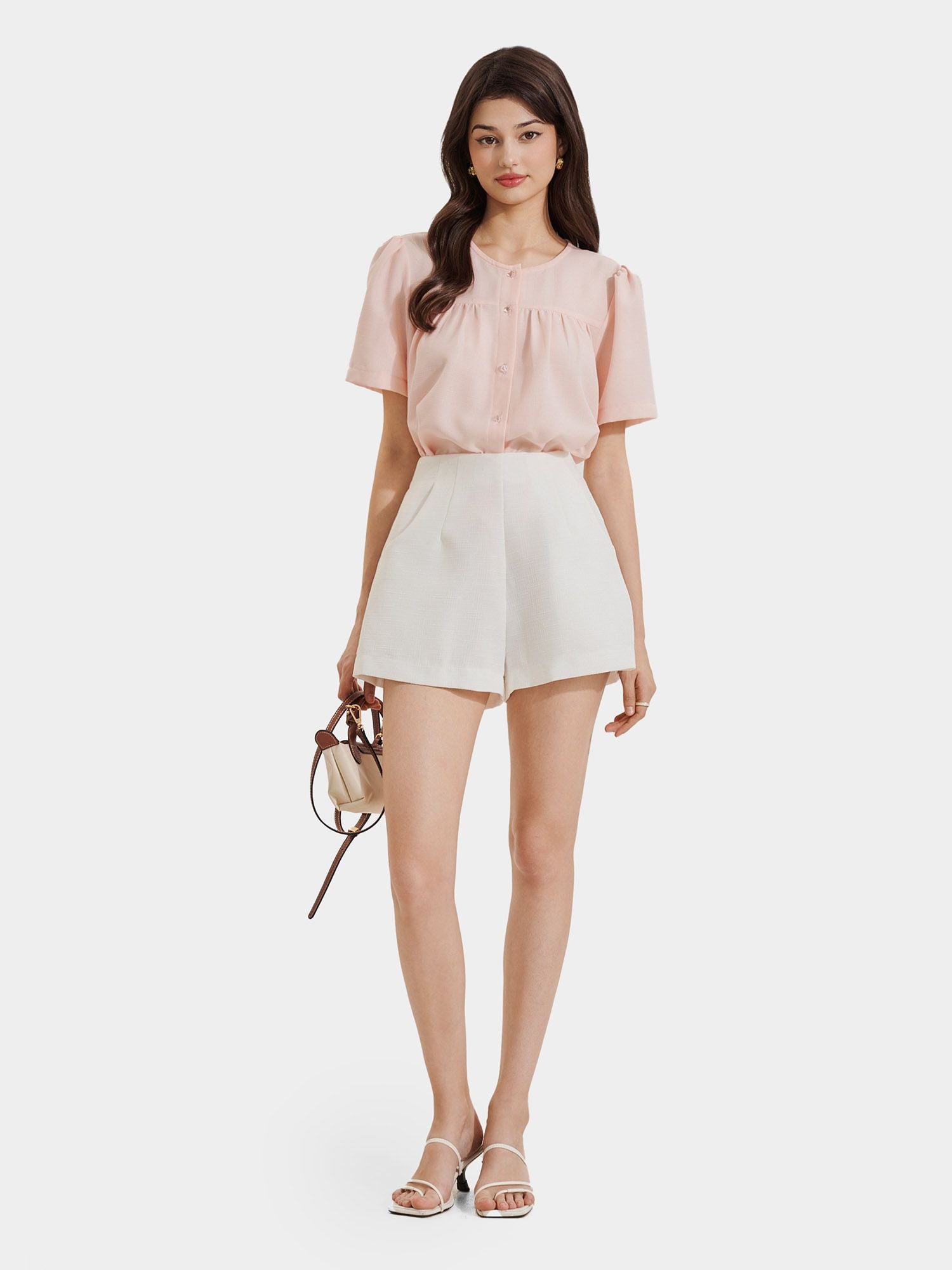  Áo cổ tròn nhún ngực tay phồng đính nút 