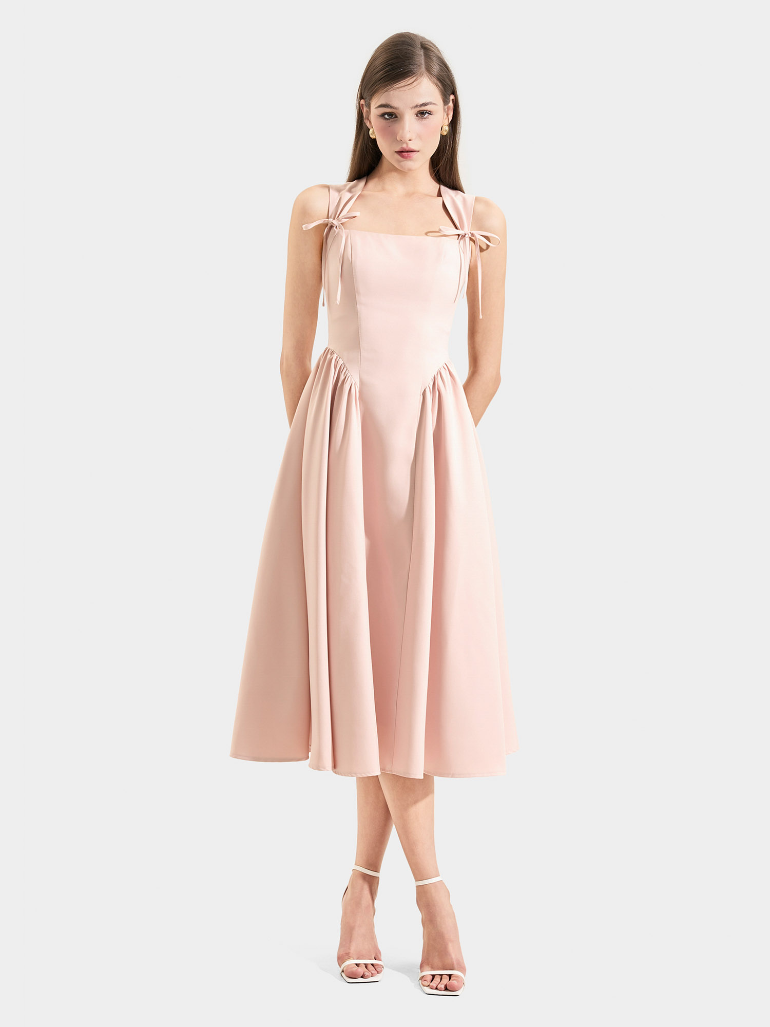 Đầm midi sát nách cổ vuông rã hông nơ ngực