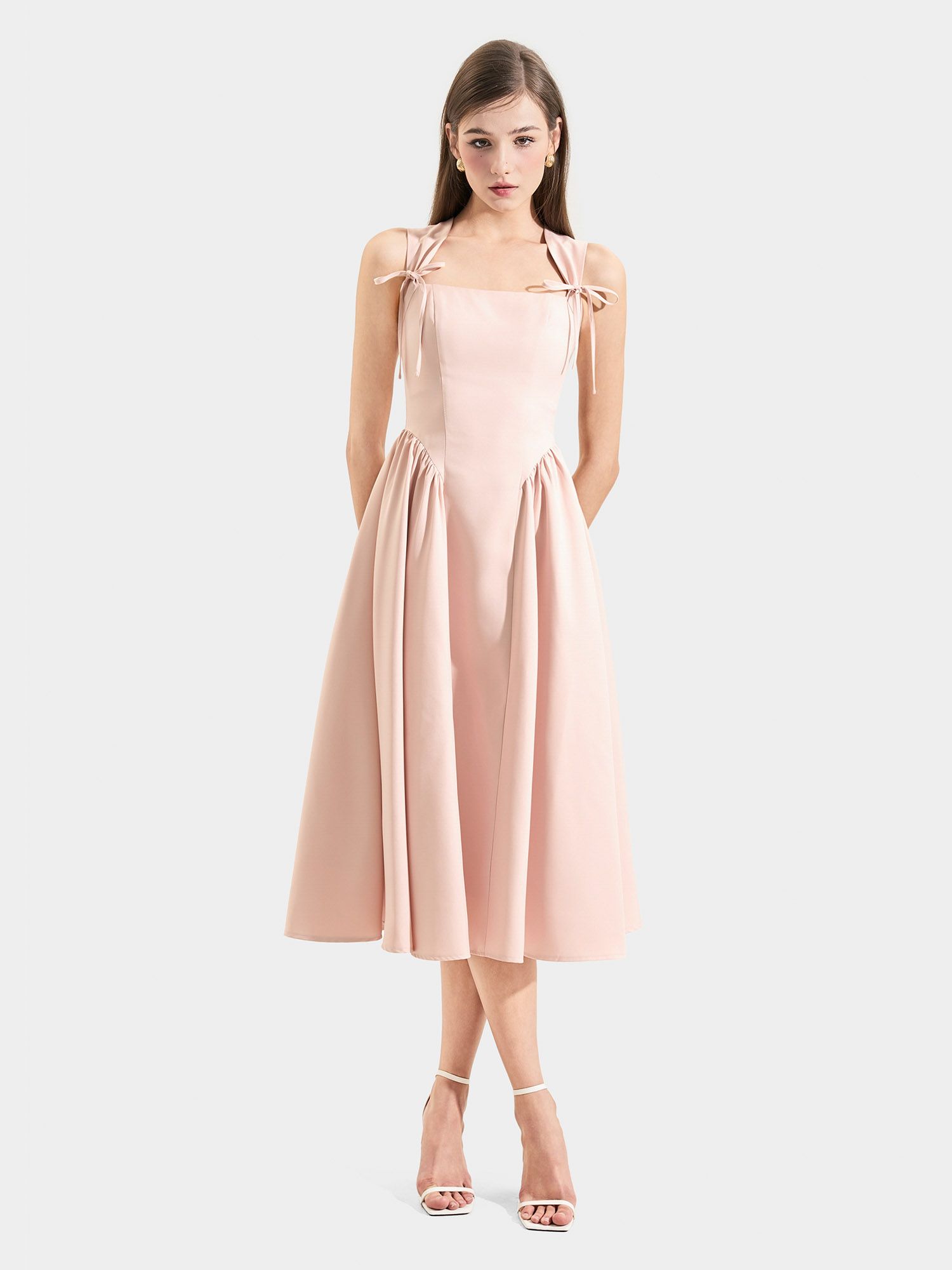  Đầm midi sát nách cổ vuông rã hông nơ ngực 