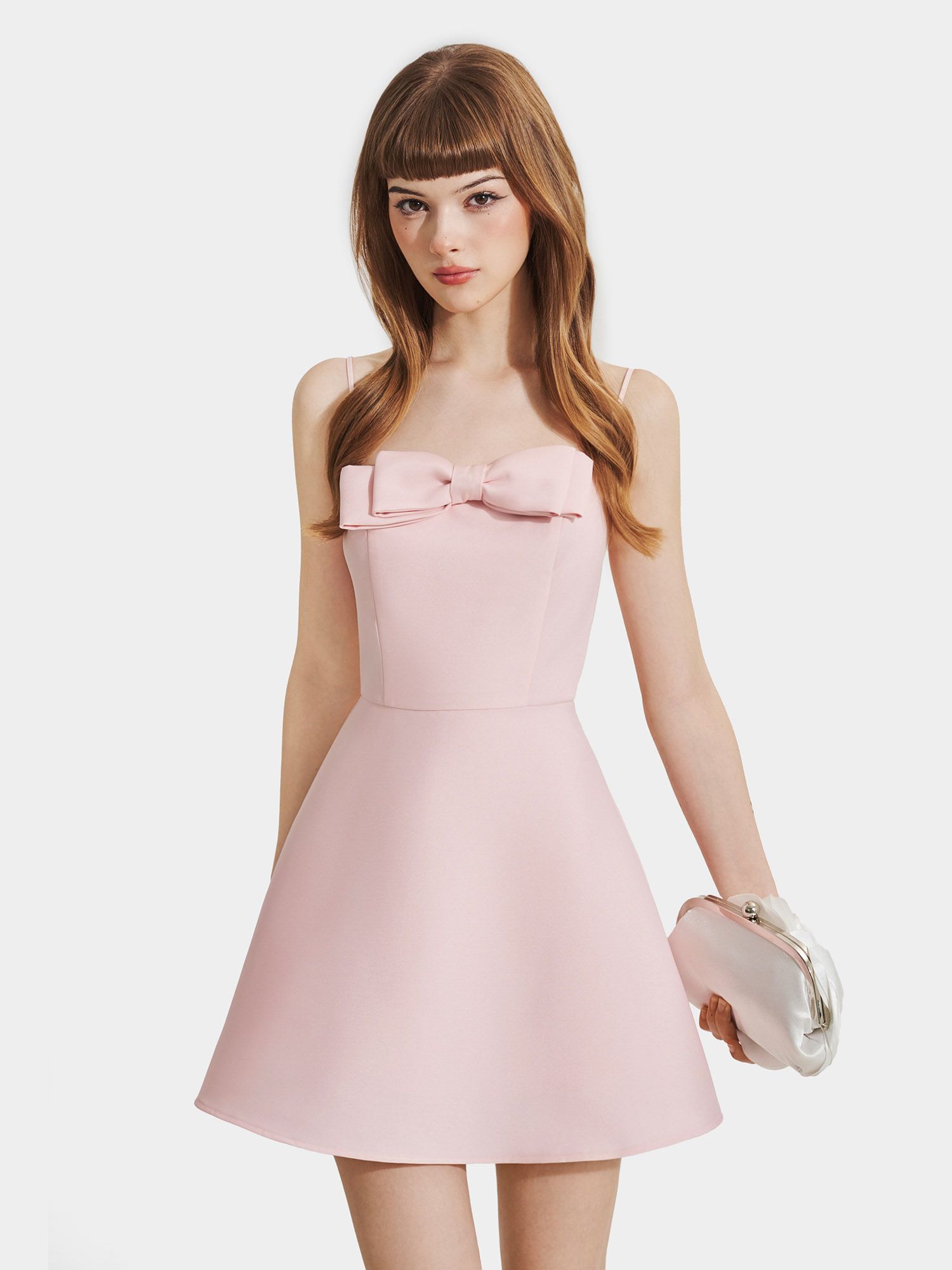  Đầm mini 2 dây form A đính nơ ngực 
