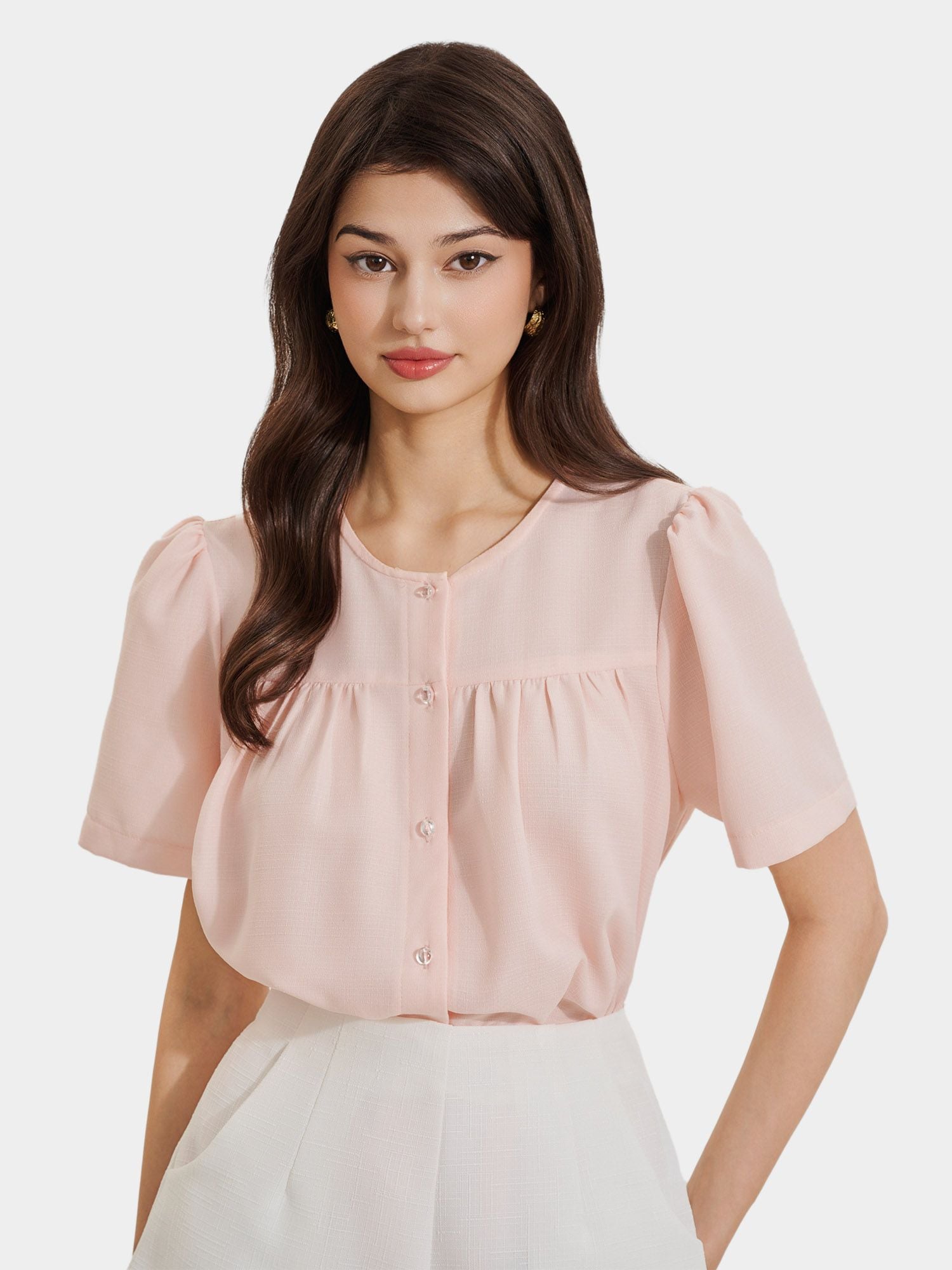  Áo cổ tròn nhún ngực tay phồng đính nút 