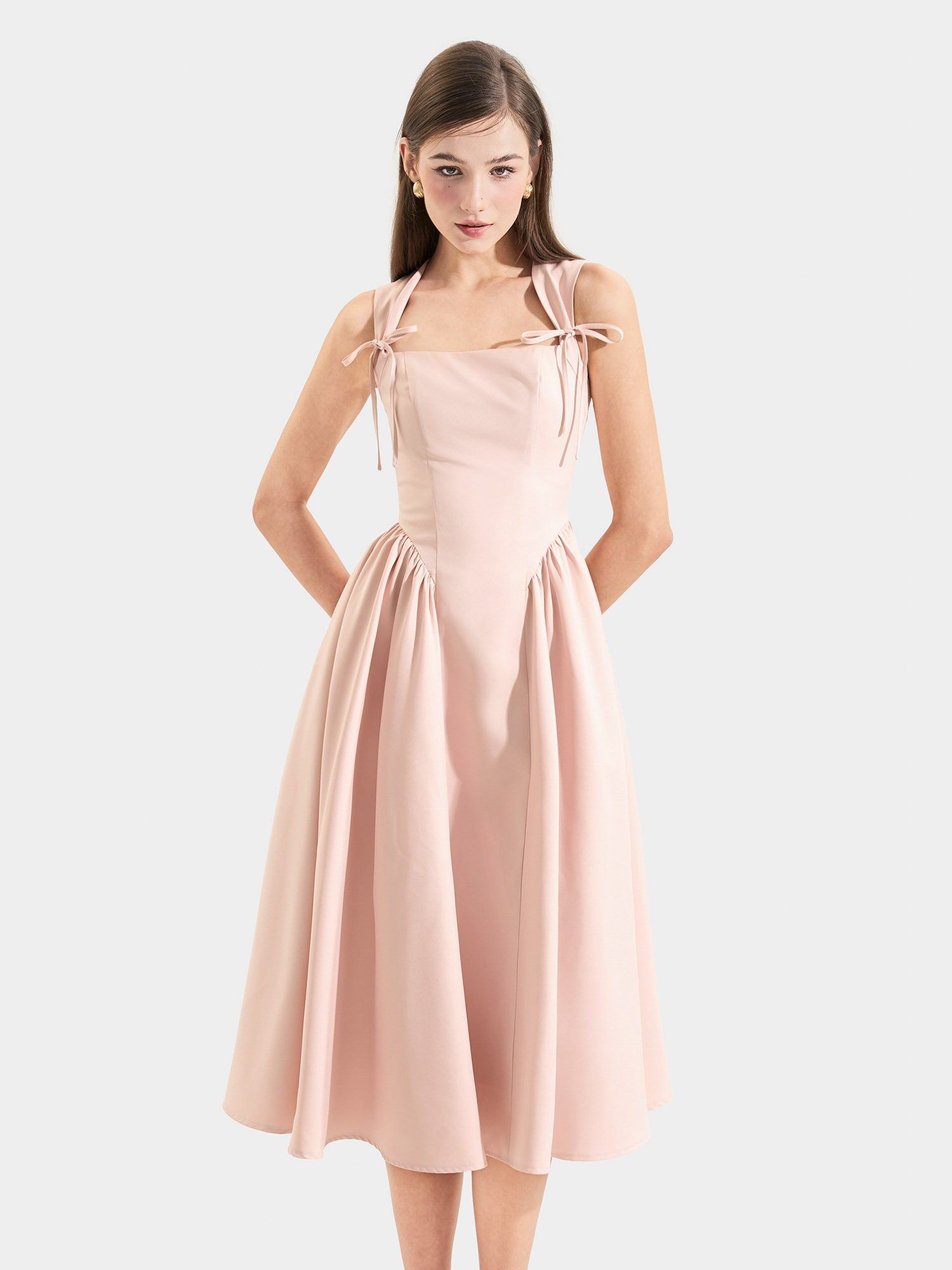  Đầm midi sát nách cổ vuông rã hông nơ ngực 
