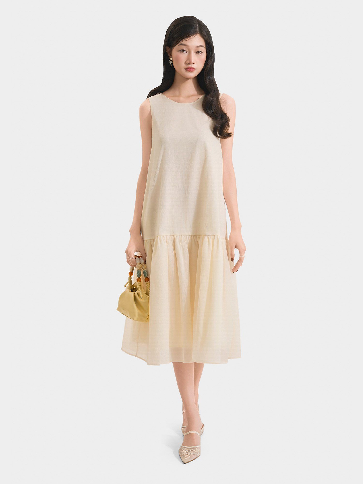  Đầm midi form suông sát nách thắt nơ lưng 