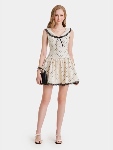  Đầm mini chấm bi sát nách cổ V đính nơ phối ren 