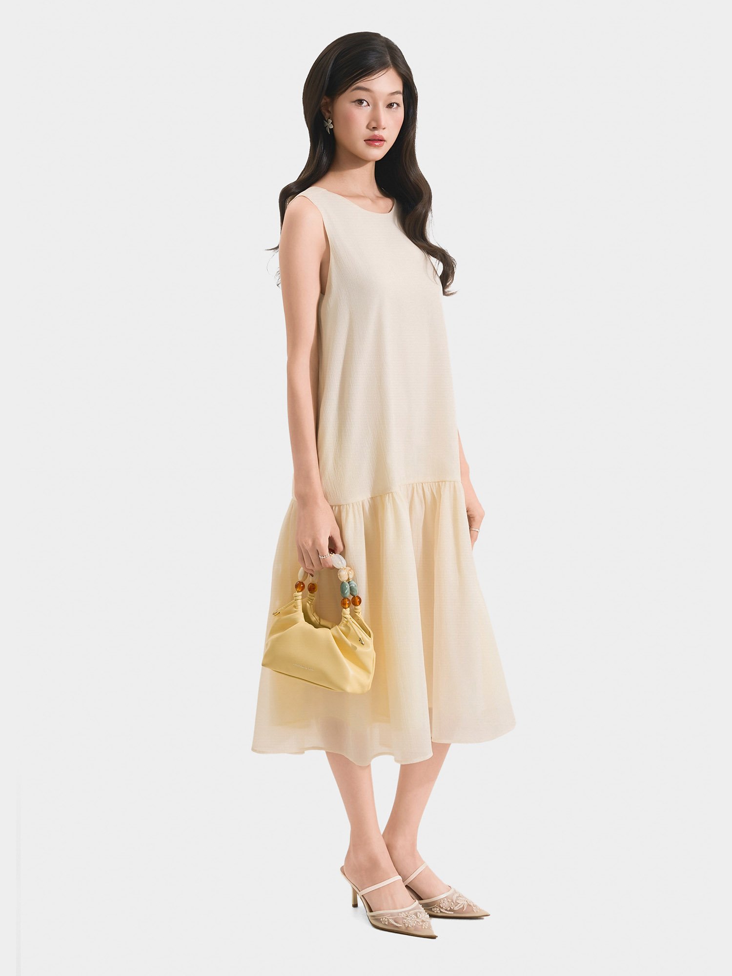 Đầm midi form suông sát nách thắt nơ lưng