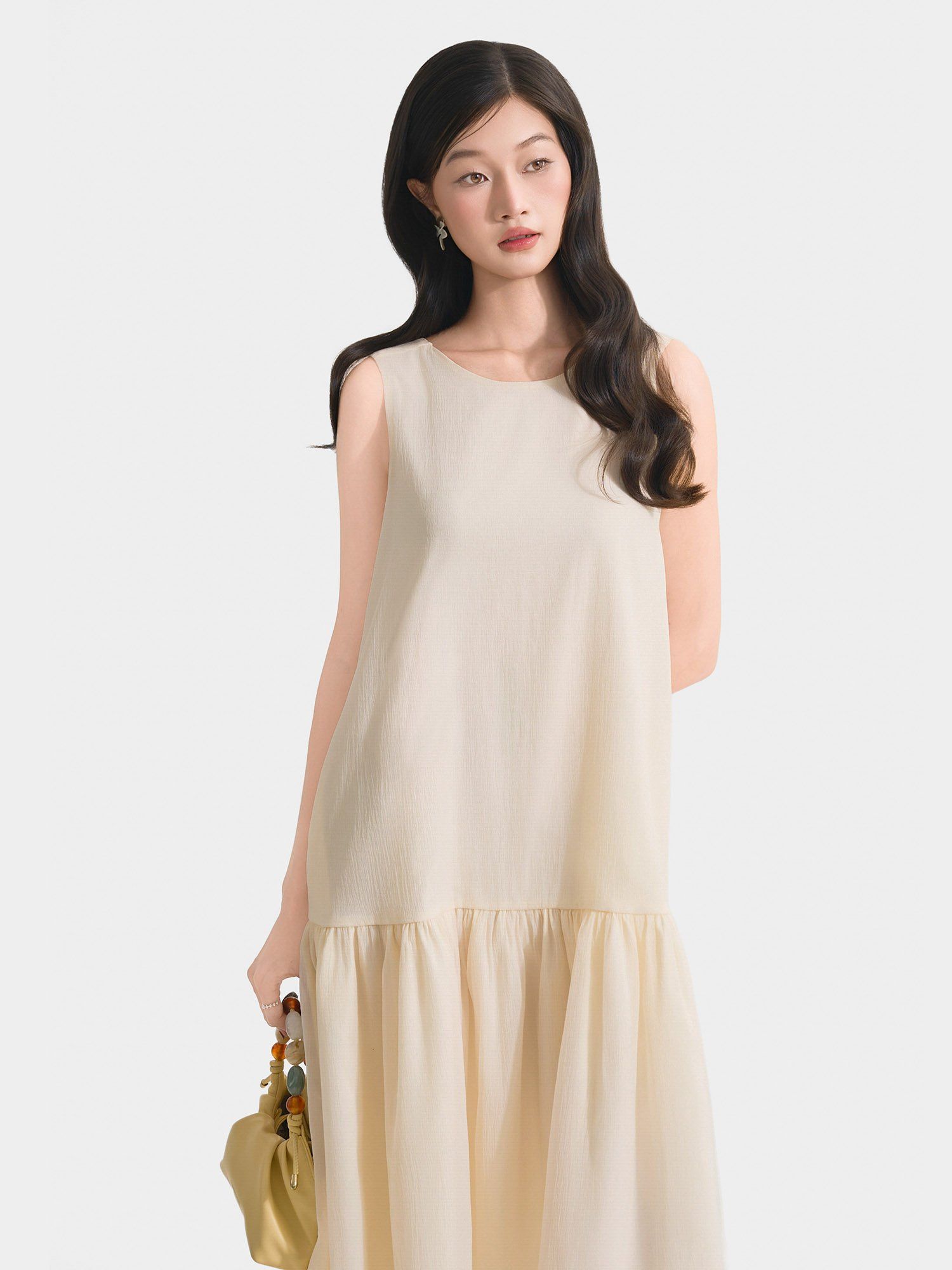  Đầm midi form suông sát nách thắt nơ lưng 
