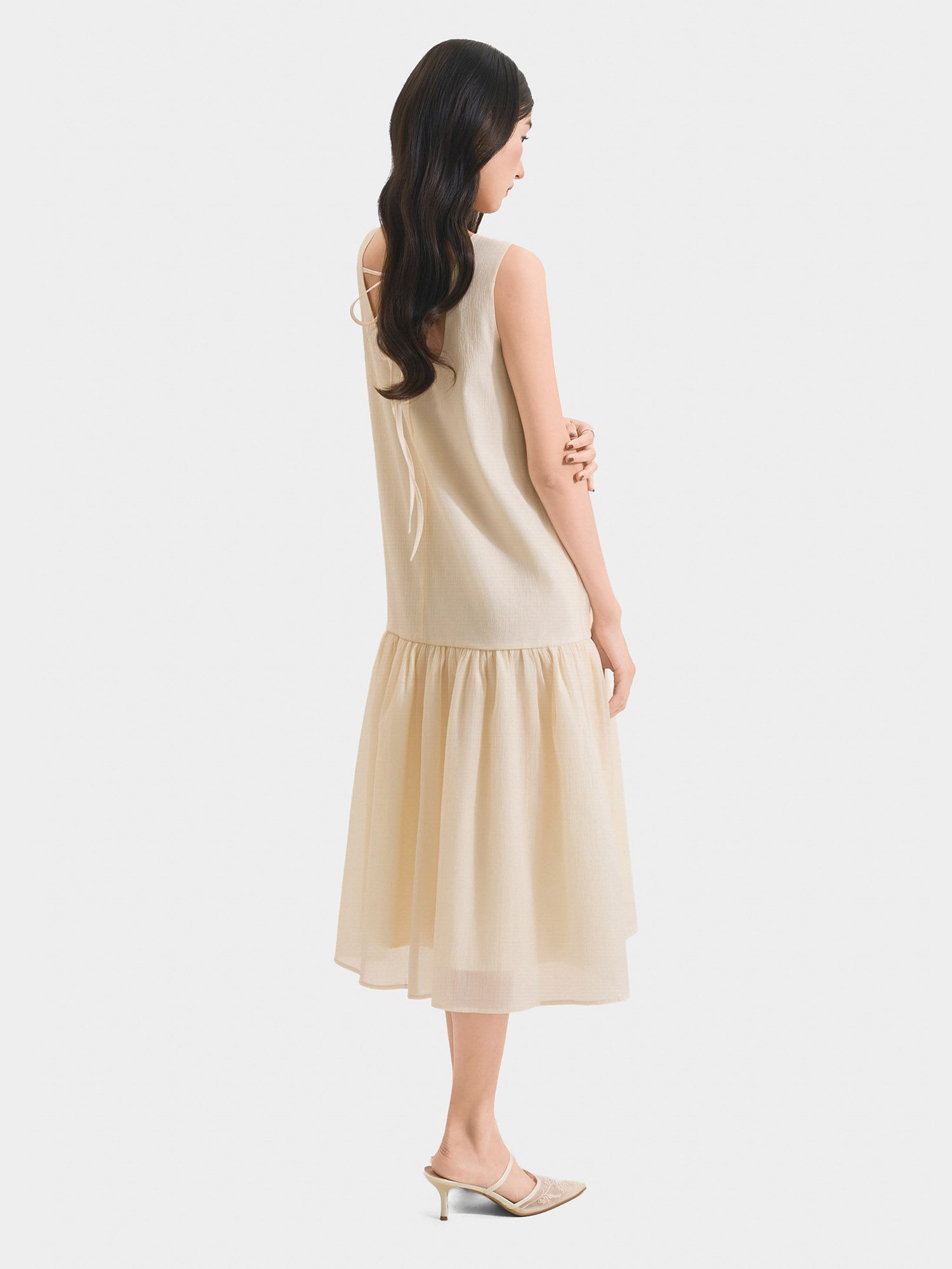  Đầm midi form suông sát nách thắt nơ lưng 