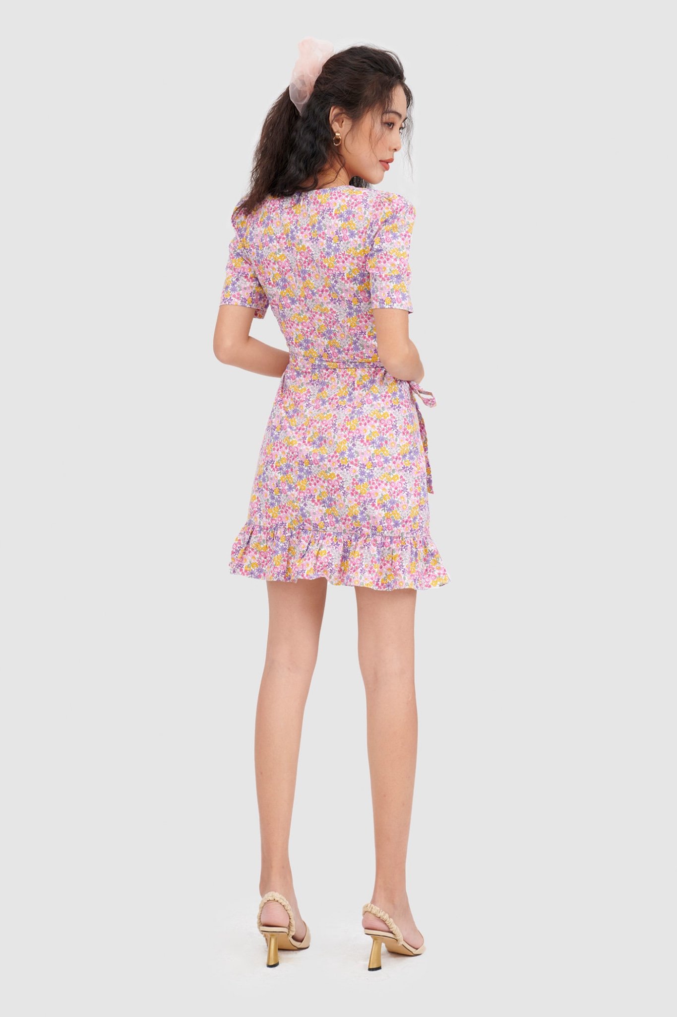 Đầm đắp chéo mini cột nơ hoạ tiết hoa