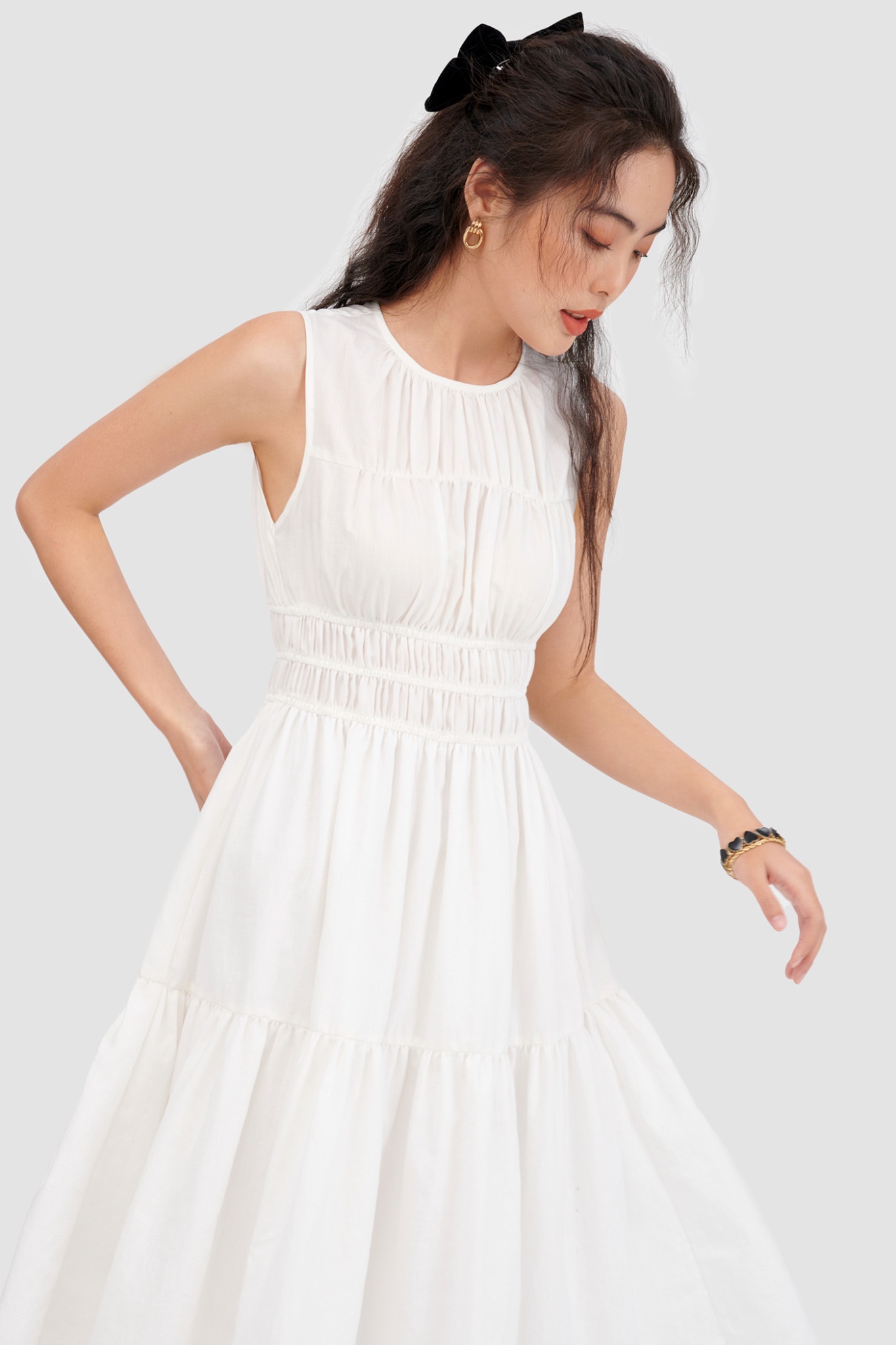 Đầm sát nách rút nhún midi 2 tầng
