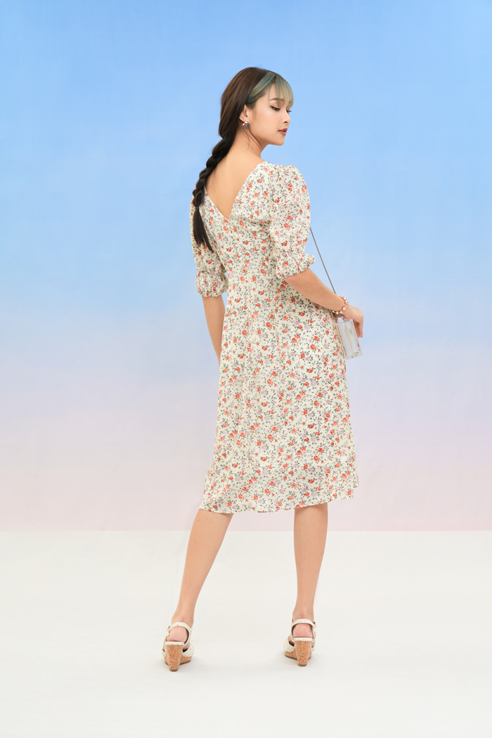 Đầm midi xoắn ngực nhấn tay
