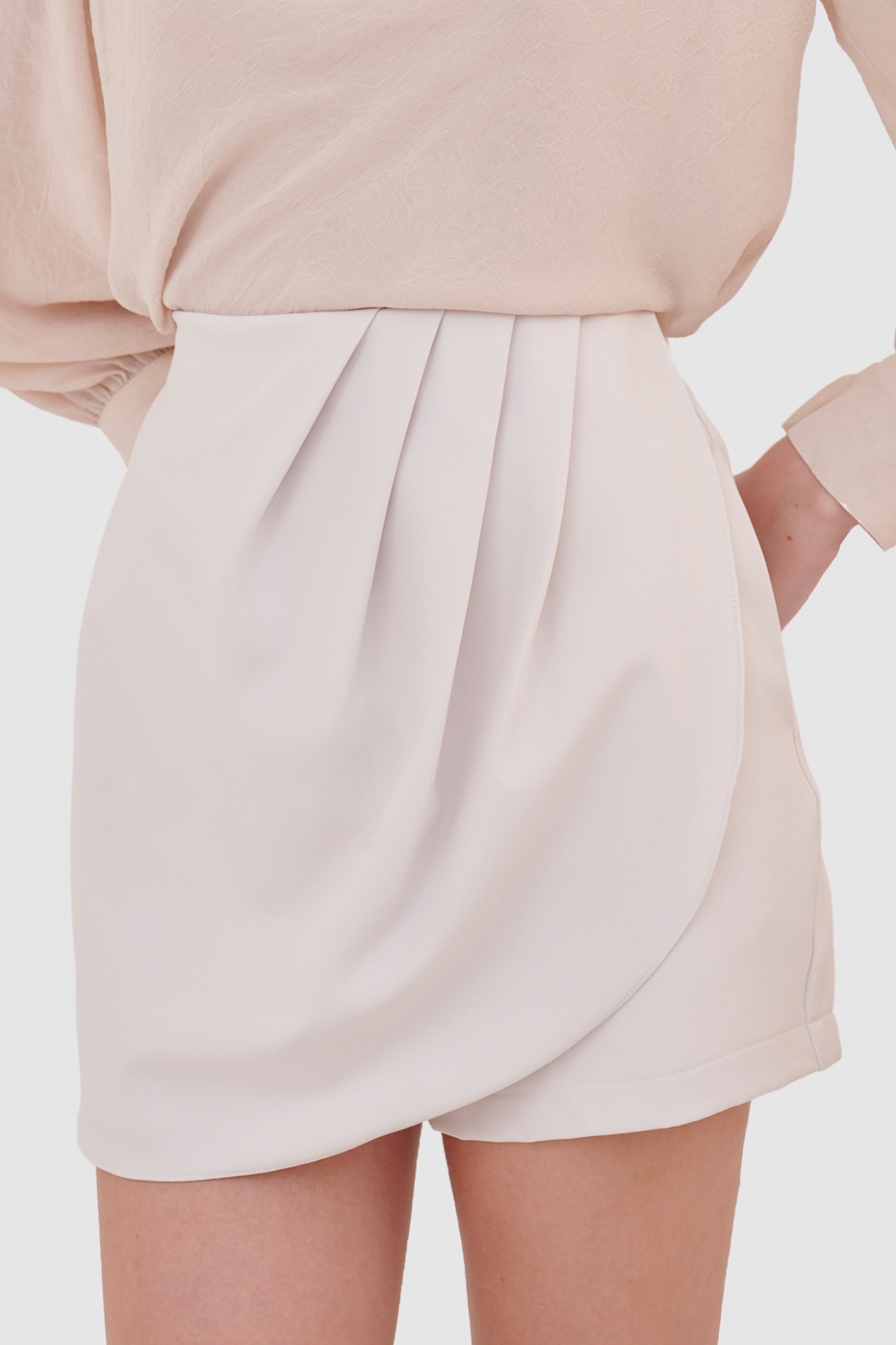 Váy skort xếp tà
