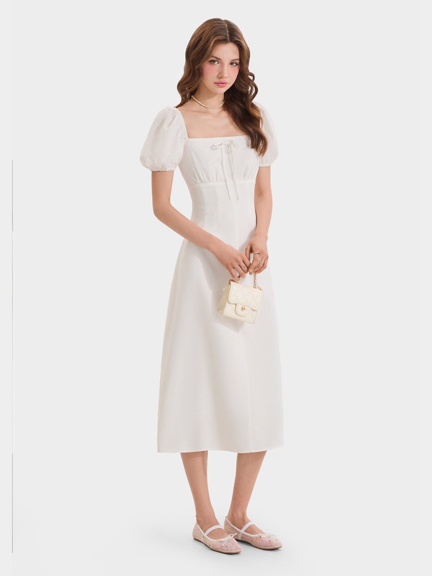  Đầm midi linen cổ vuông tay phồng smocking lưng 